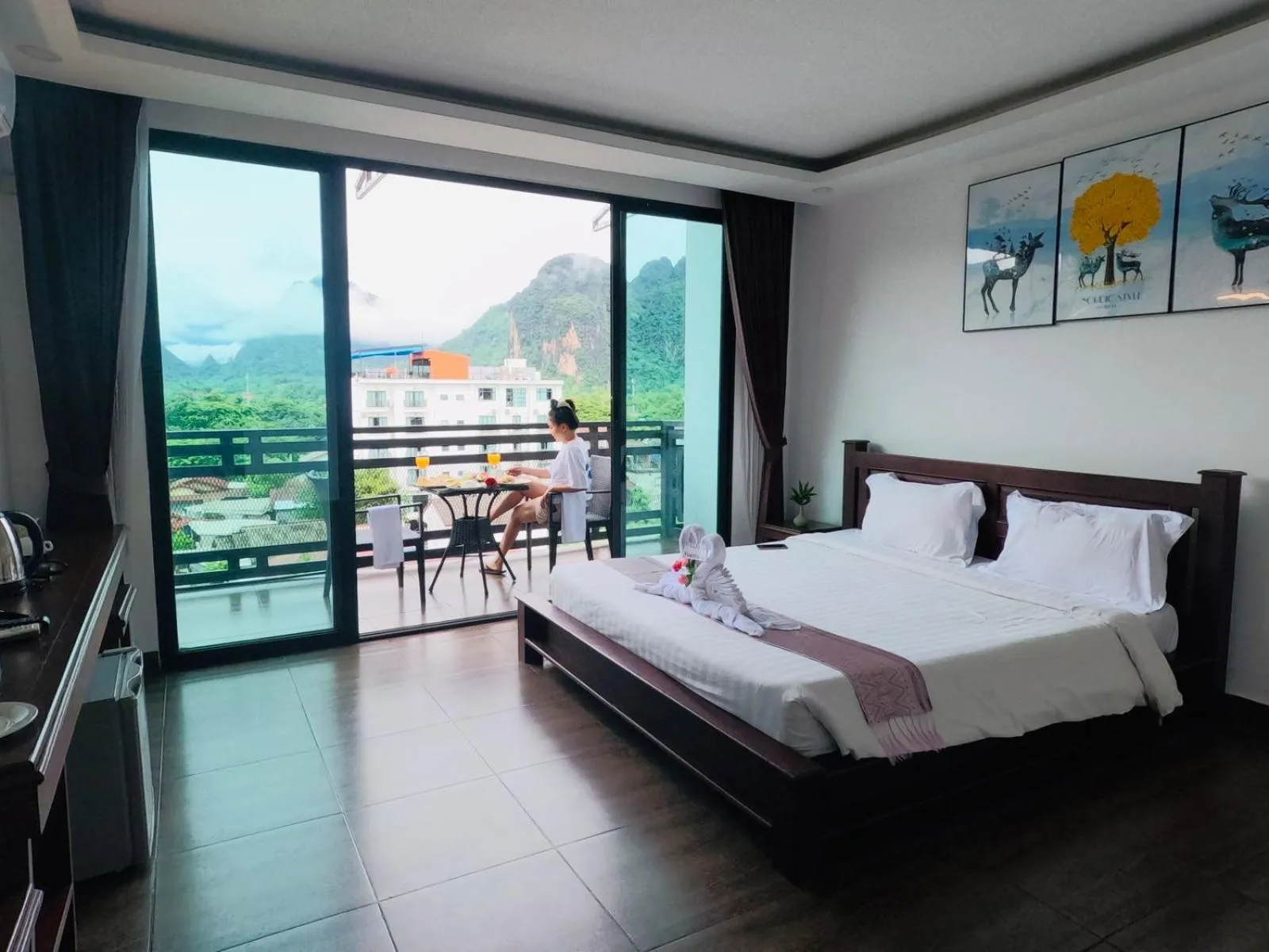 Bed in VANG VIENG TOPVIEW HOTEL