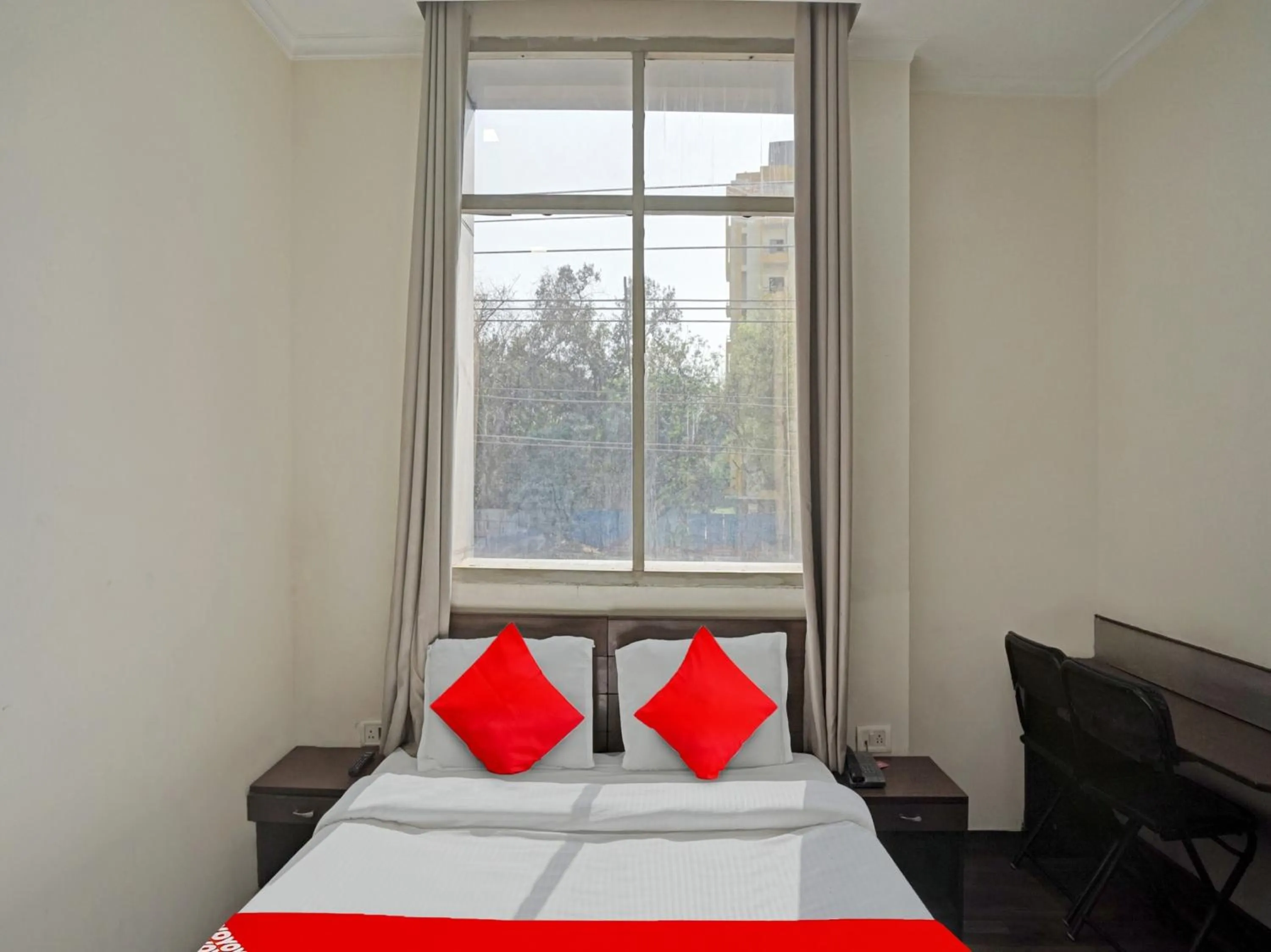 Bedroom in Hotel O Grand Stay