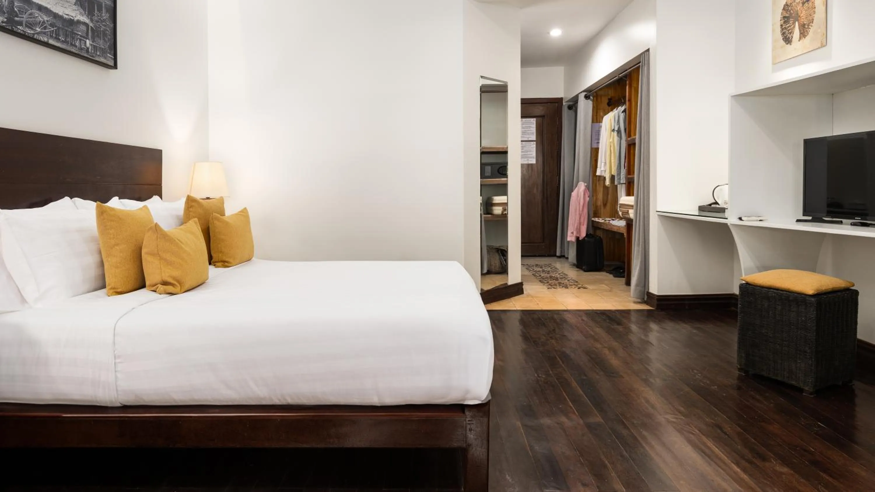 Bed in Pavillon d'Orient Boutique Hotel