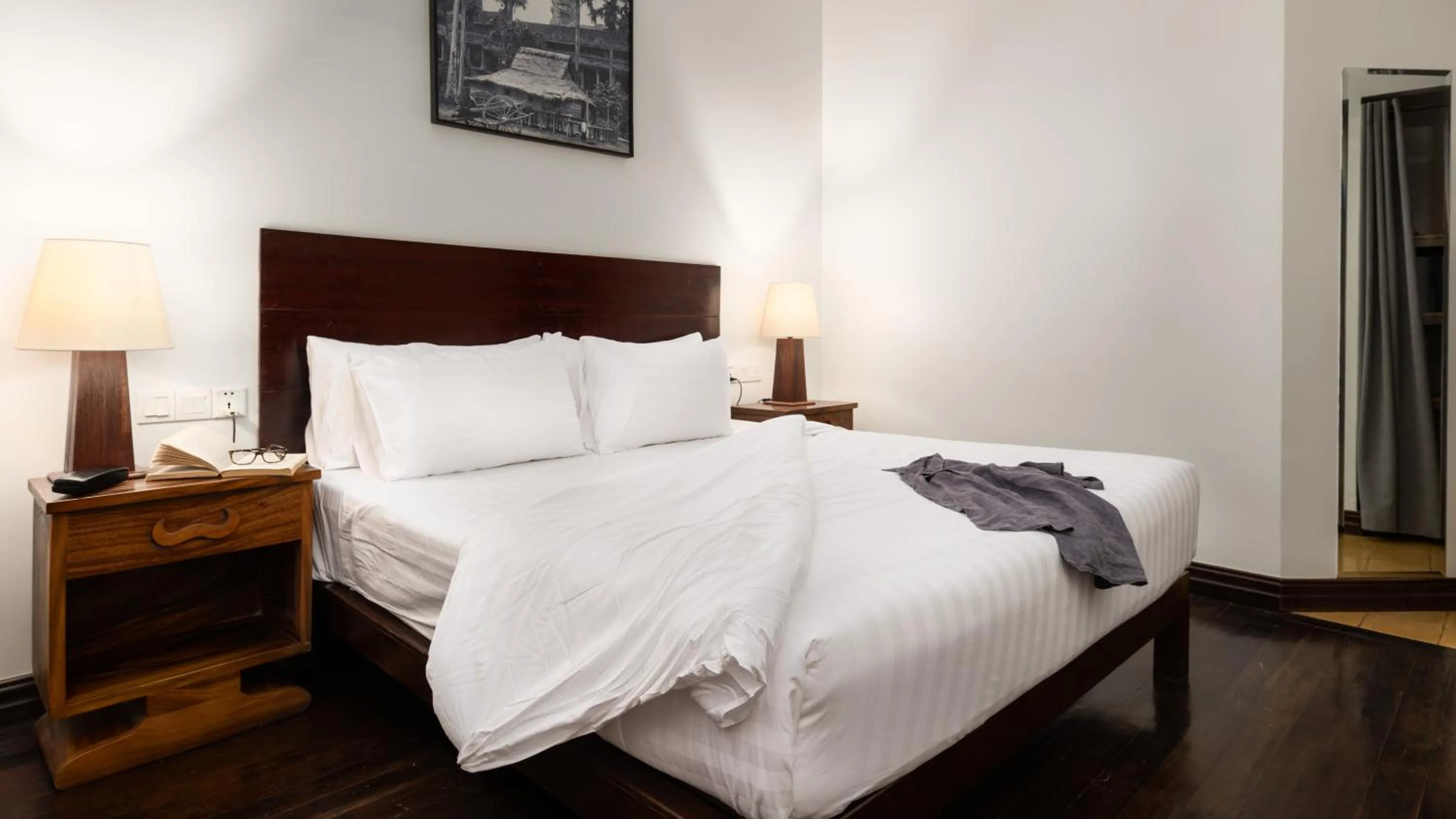 Bed in Pavillon d'Orient Boutique Hotel