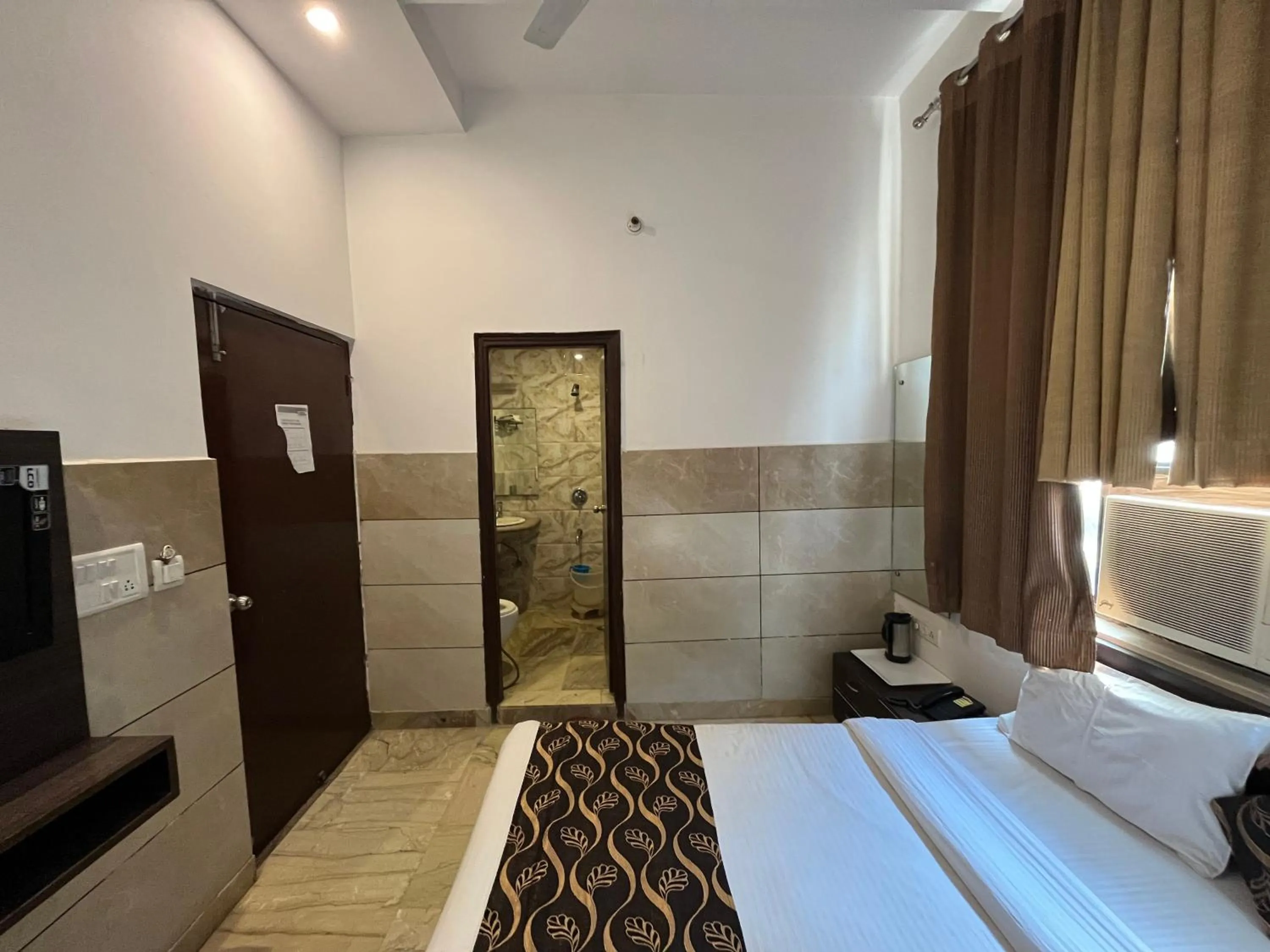 Bed in Hotel Taj Galaxy