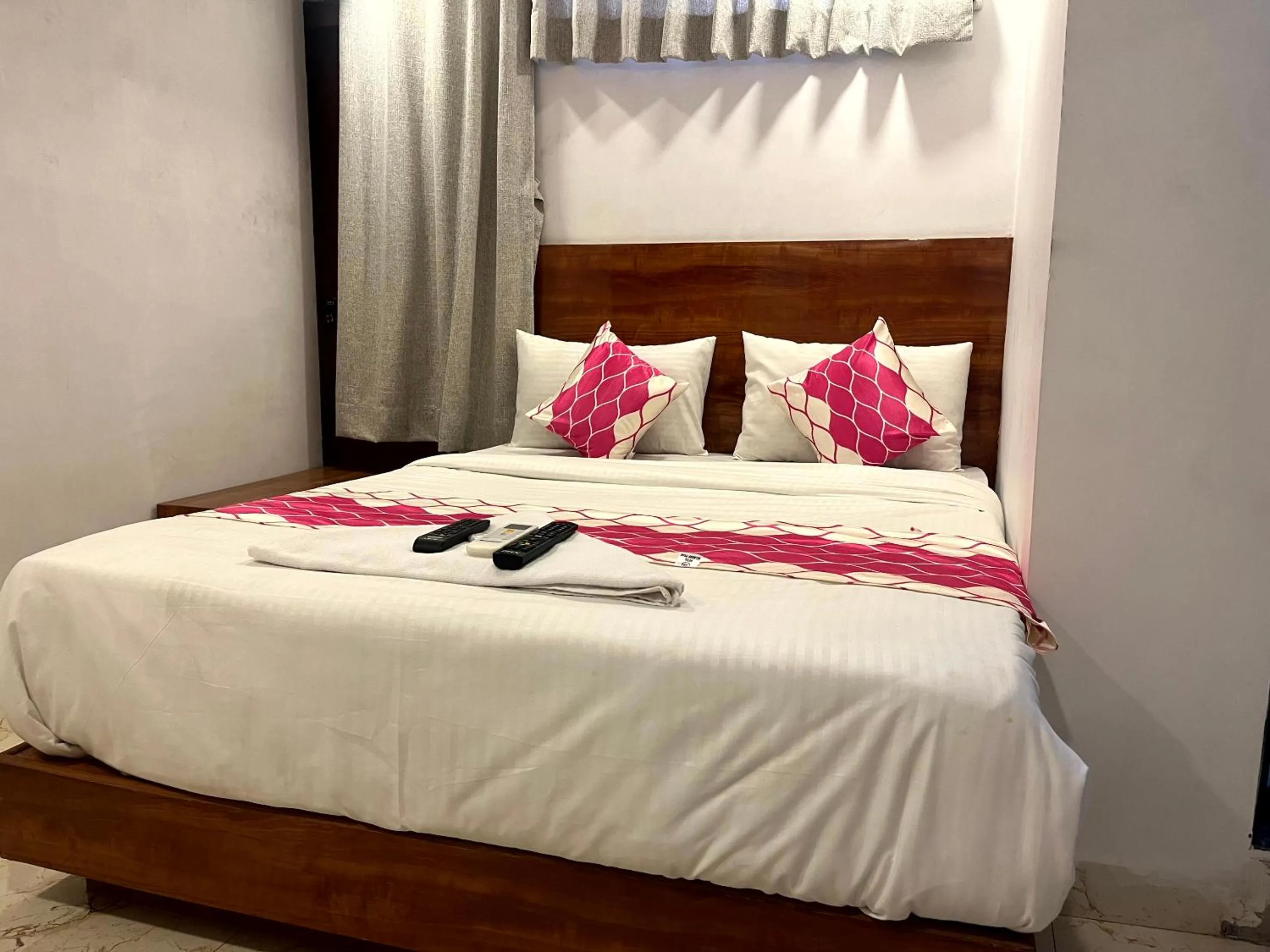 Photo of the whole room in Hotel Delmond Prime- Near NESCO