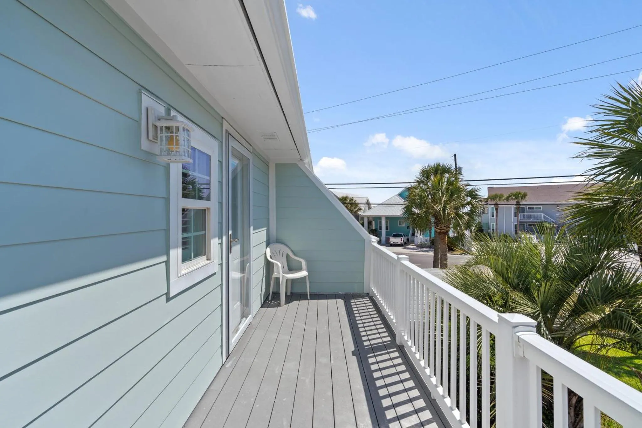 Balcony/Terrace in 140 Feet To White Sandy Beaches! Newly Renovated! Pool! Grill!