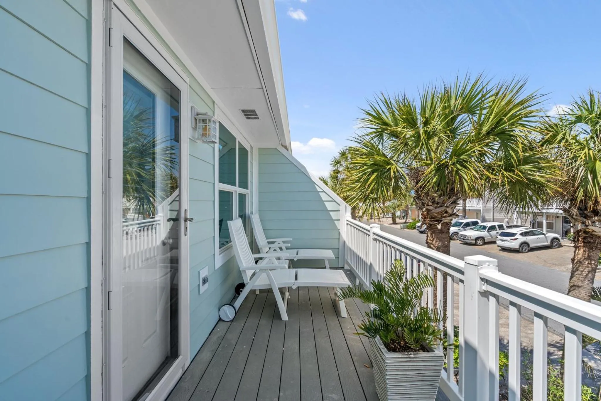 Balcony/Terrace in 140 Feet To White Sandy Beaches! Newly Renovated! Pool! Grill!