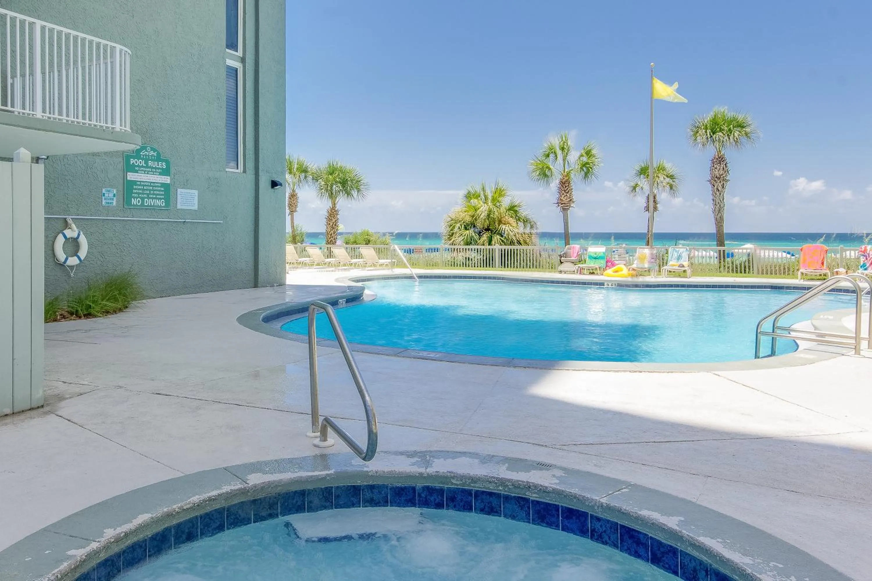 Swimming pool in Beautiful Long Beach Condo unit 1-1206! TWO Gulf Masters!