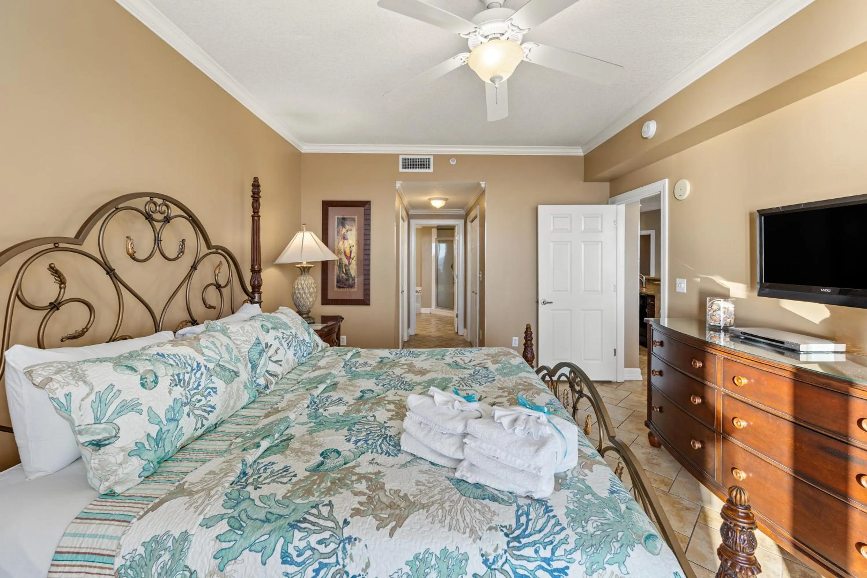 Bed in Gulf Front Master Bedroom, 2 Pools & Hot Tubs, Sleeps 8