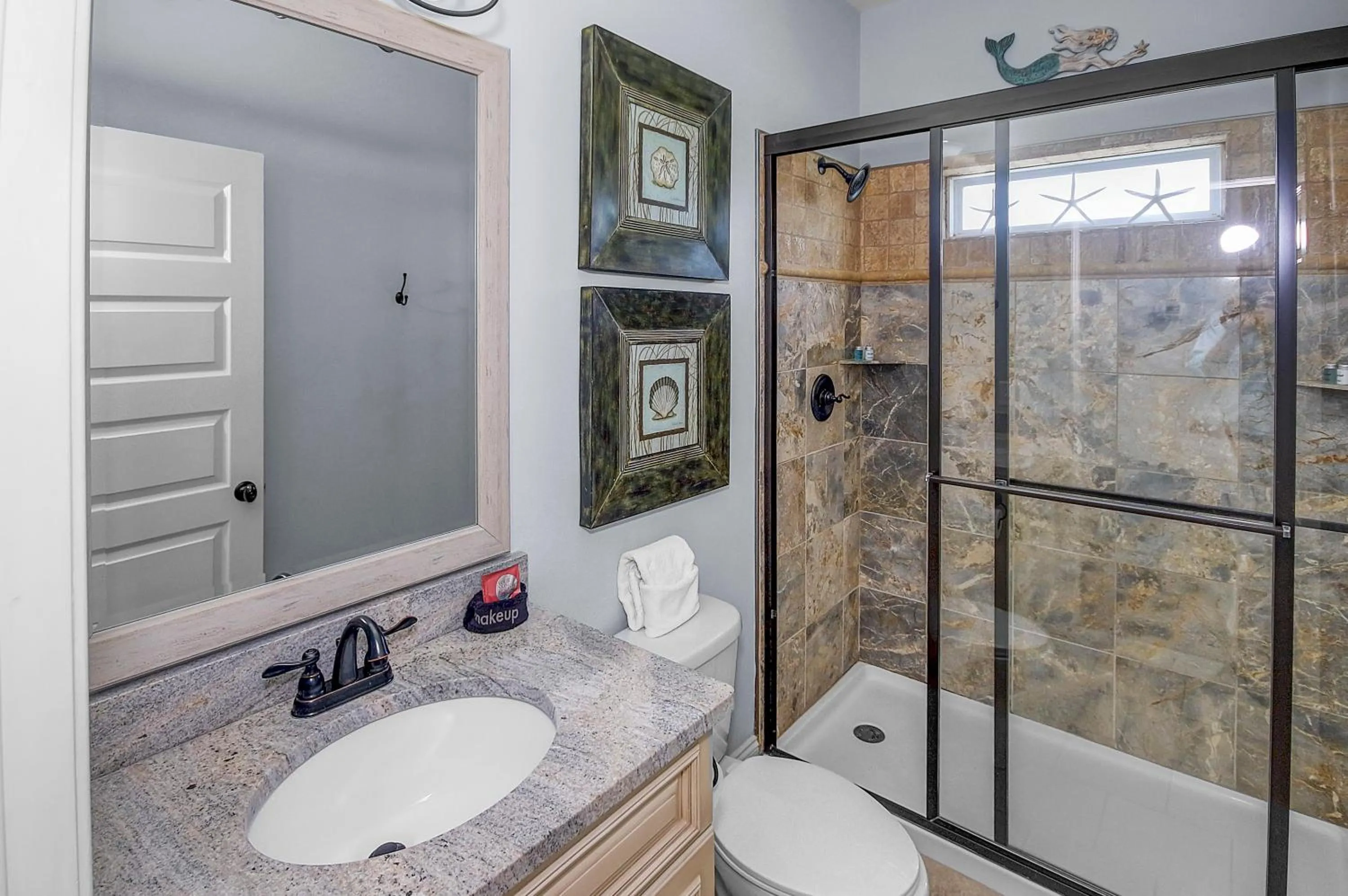 Photo of the whole room in 5 Bed, 5 Bath Beach Home/Only a 3 Minute Walk To The Beach! SLEEPS 12