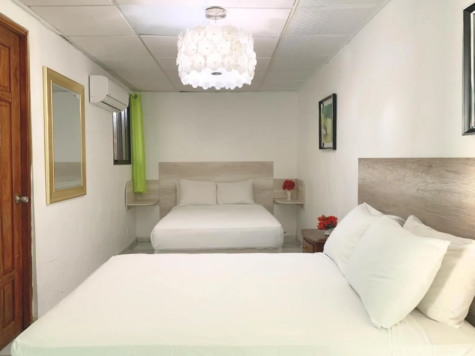 Bed in Pacific Coast Hotel