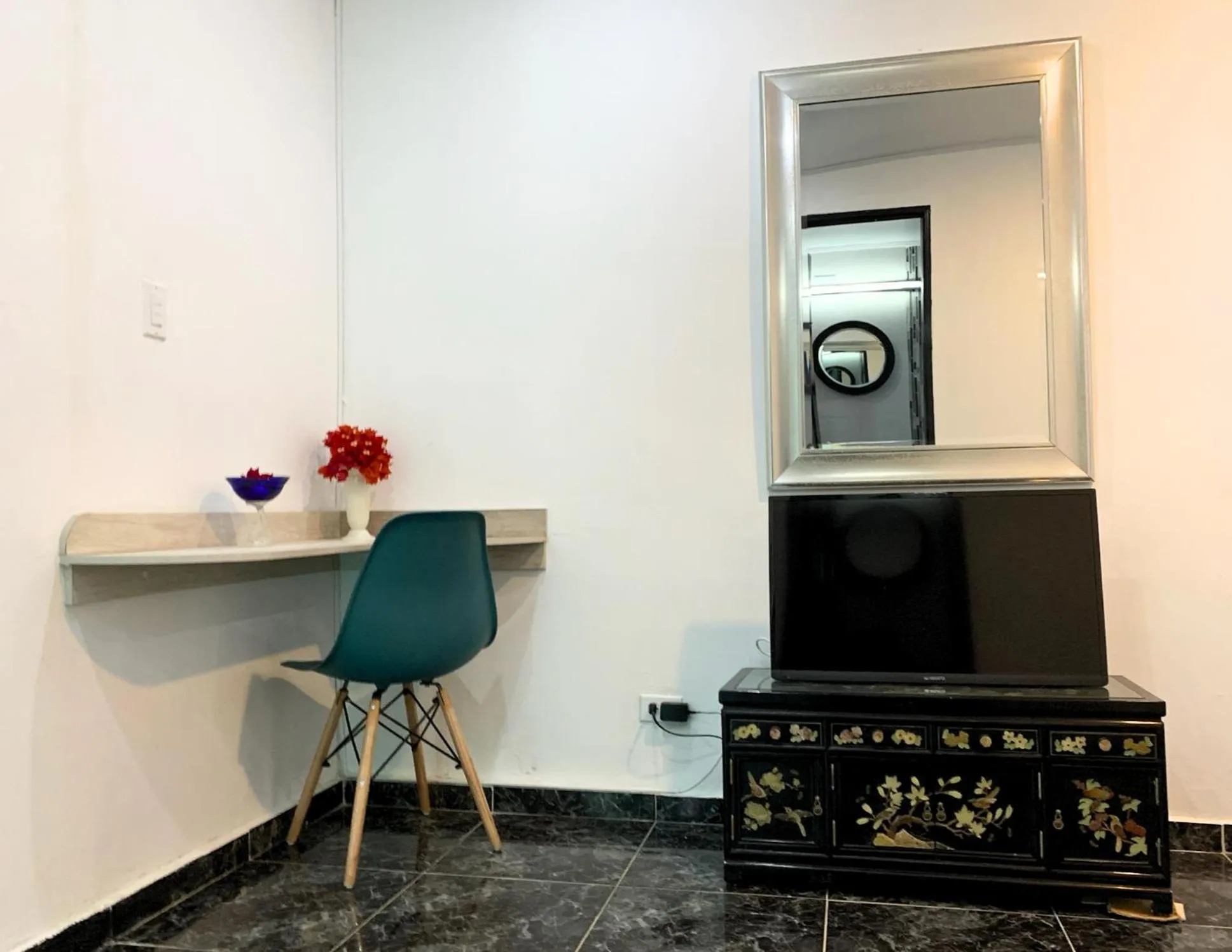 Bedroom in Pacific Coast Hotel