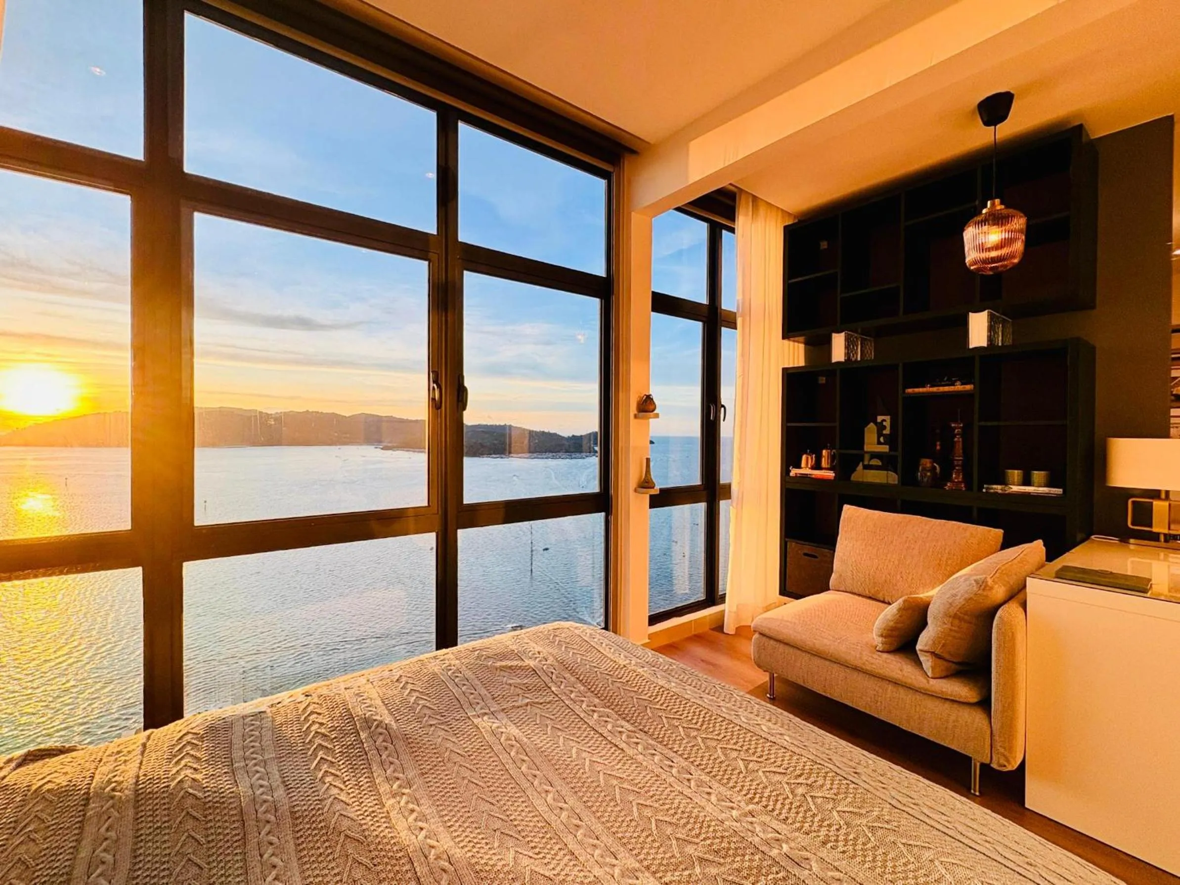 Bed in Seaview Bliss Studio By Tropical Elegance