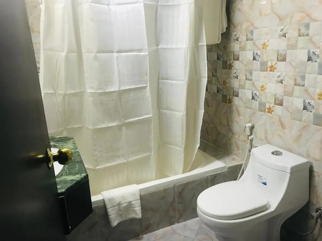 Bathroom in Three 888 Hotel