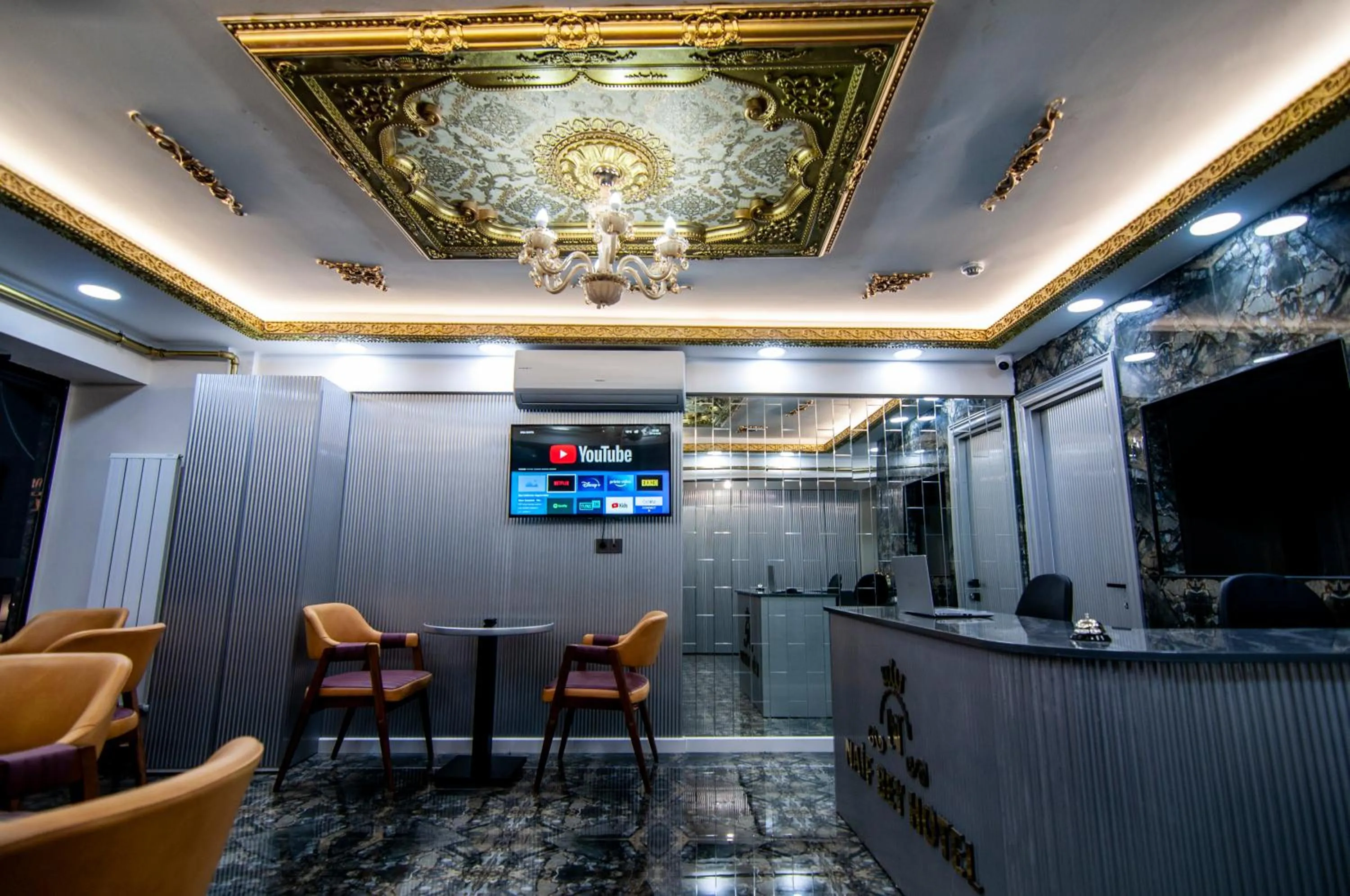 Communal lounge/ TV room in Naif Bey Hotel