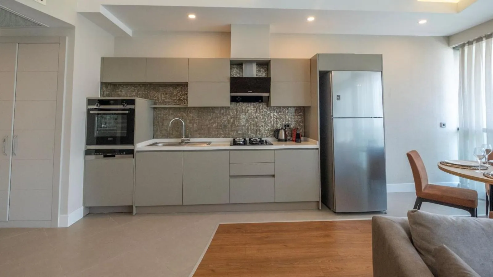 Kitchen or kitchenette in Sirius Town Residence and Spa