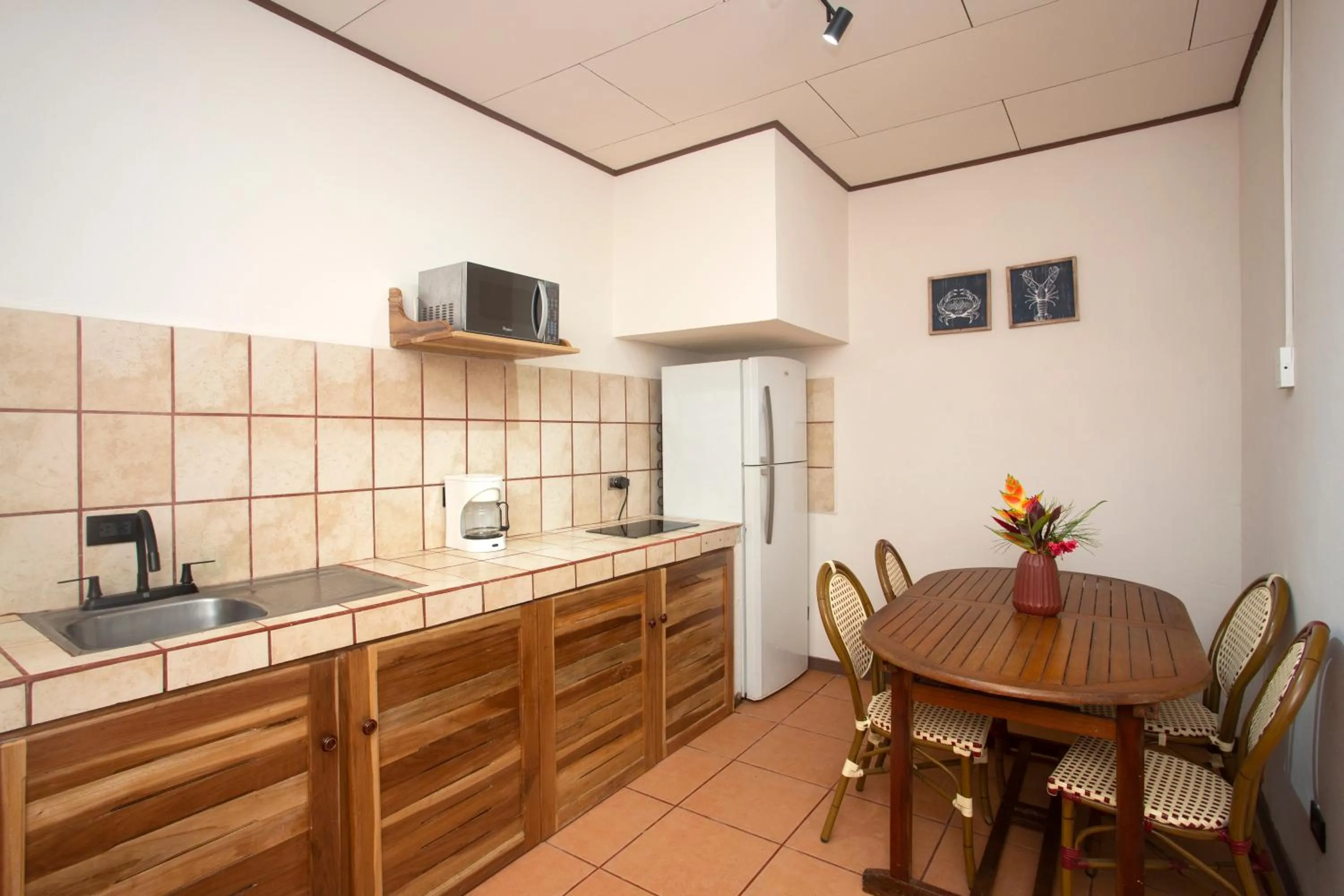 Kitchen or kitchenette in Manzanillo Caribbean Resort