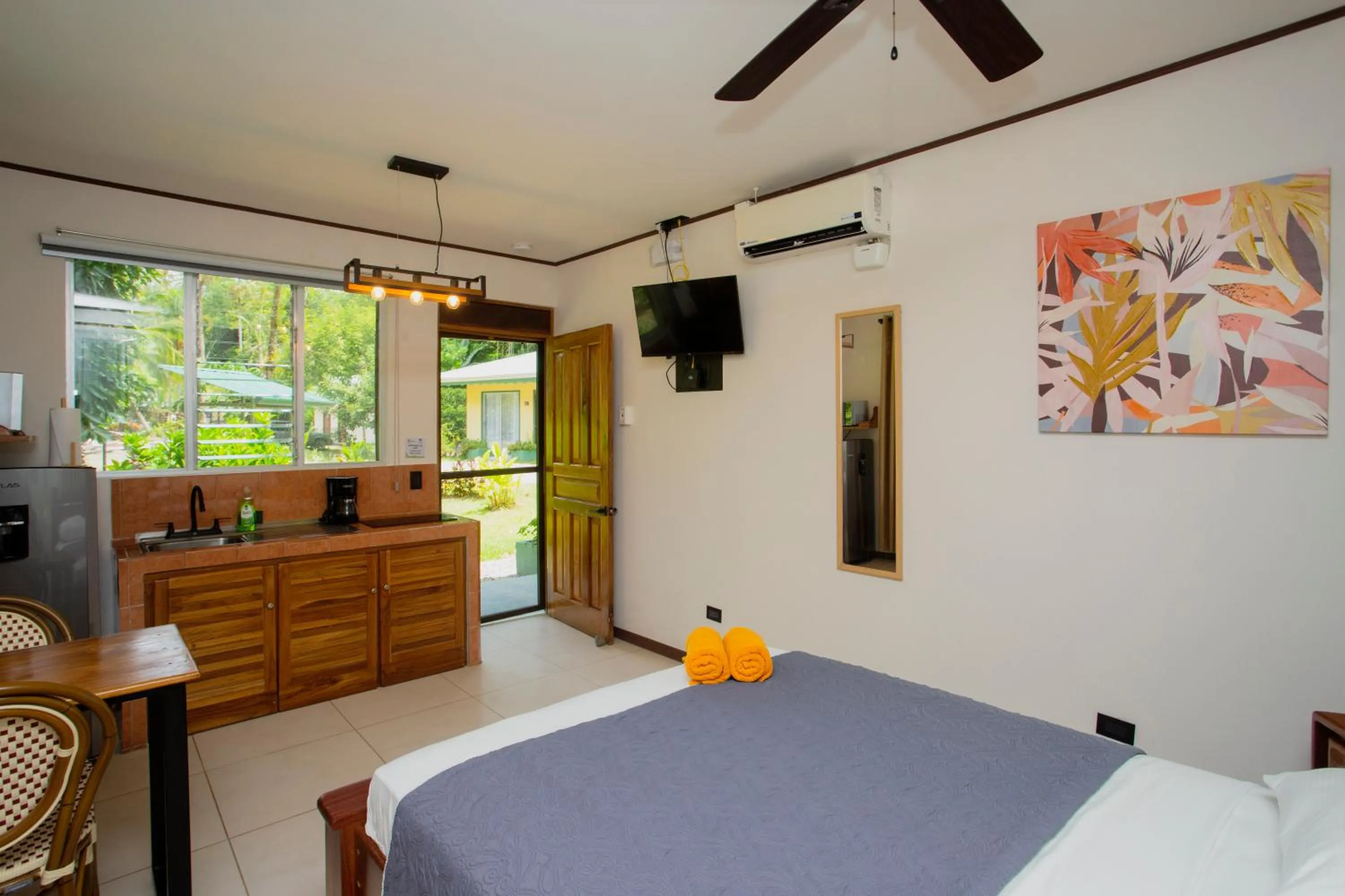 Bed in Manzanillo Caribbean Resort