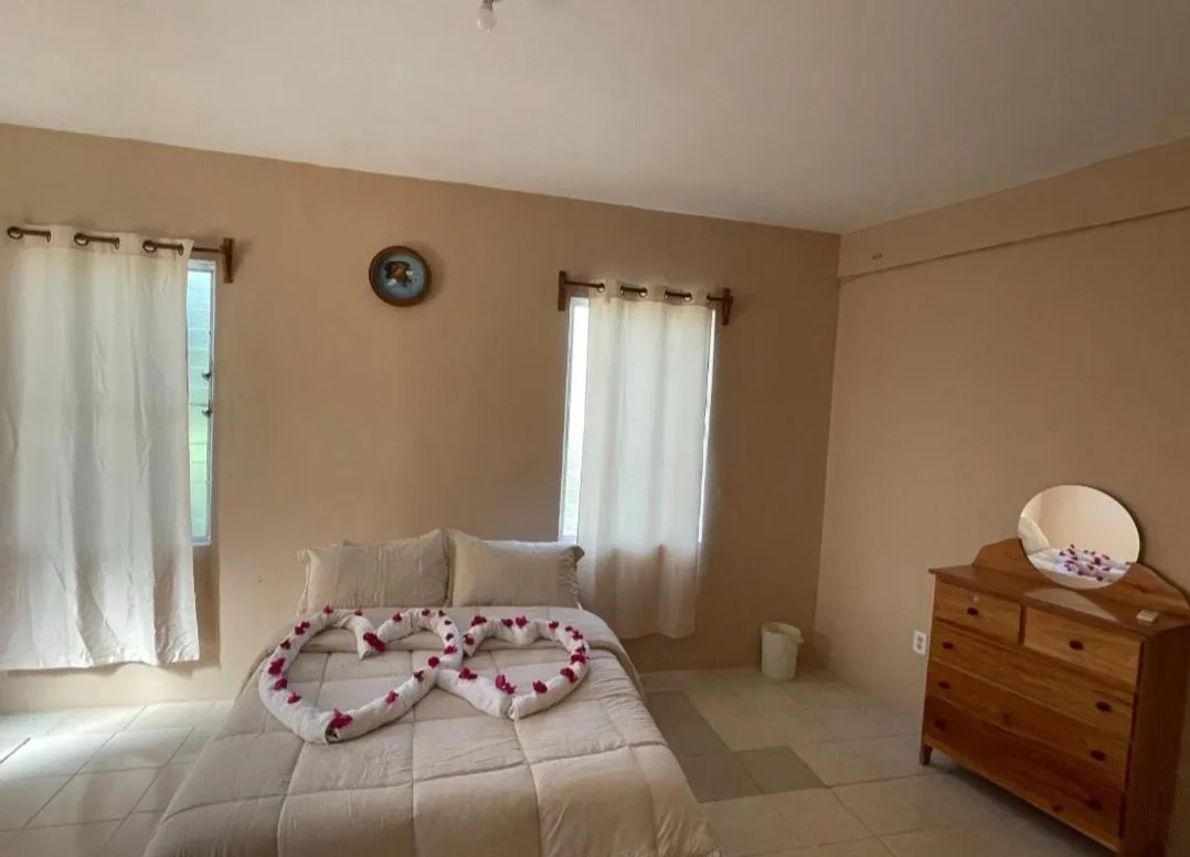 Bed in Arnold's Guest House