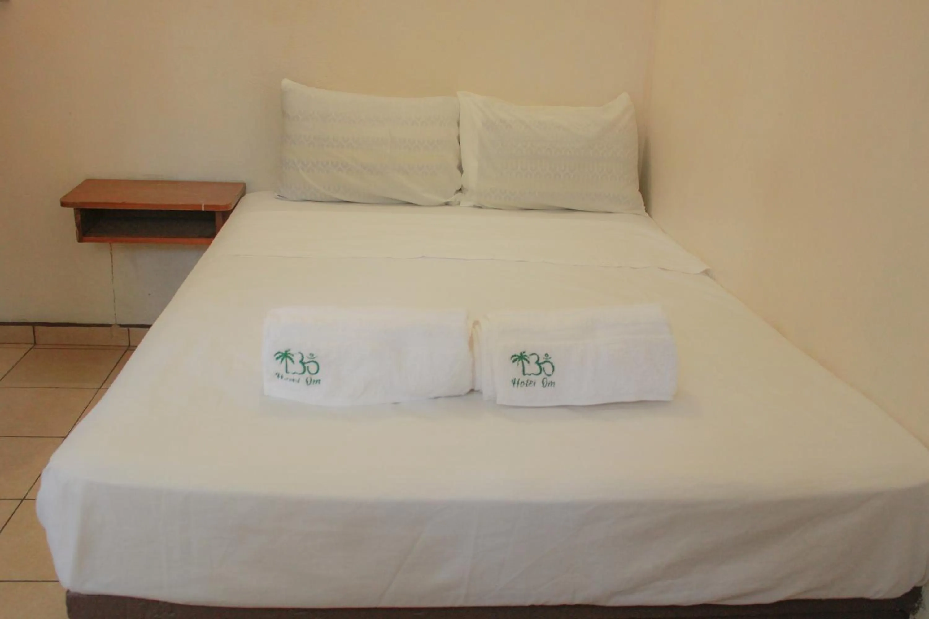 Bedroom, Bed in Hotel OM DownTown