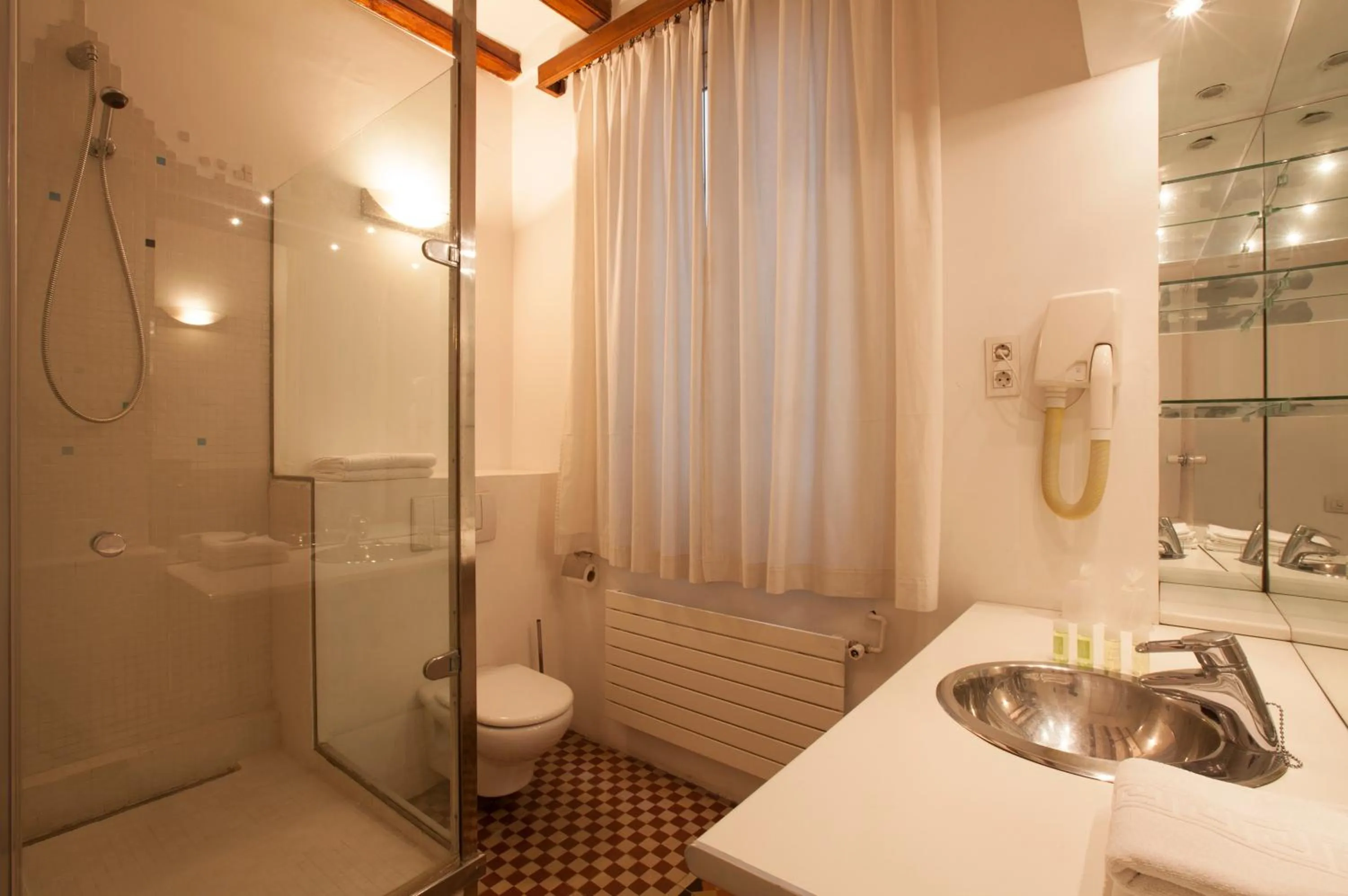 Bathroom in Alba Hotel