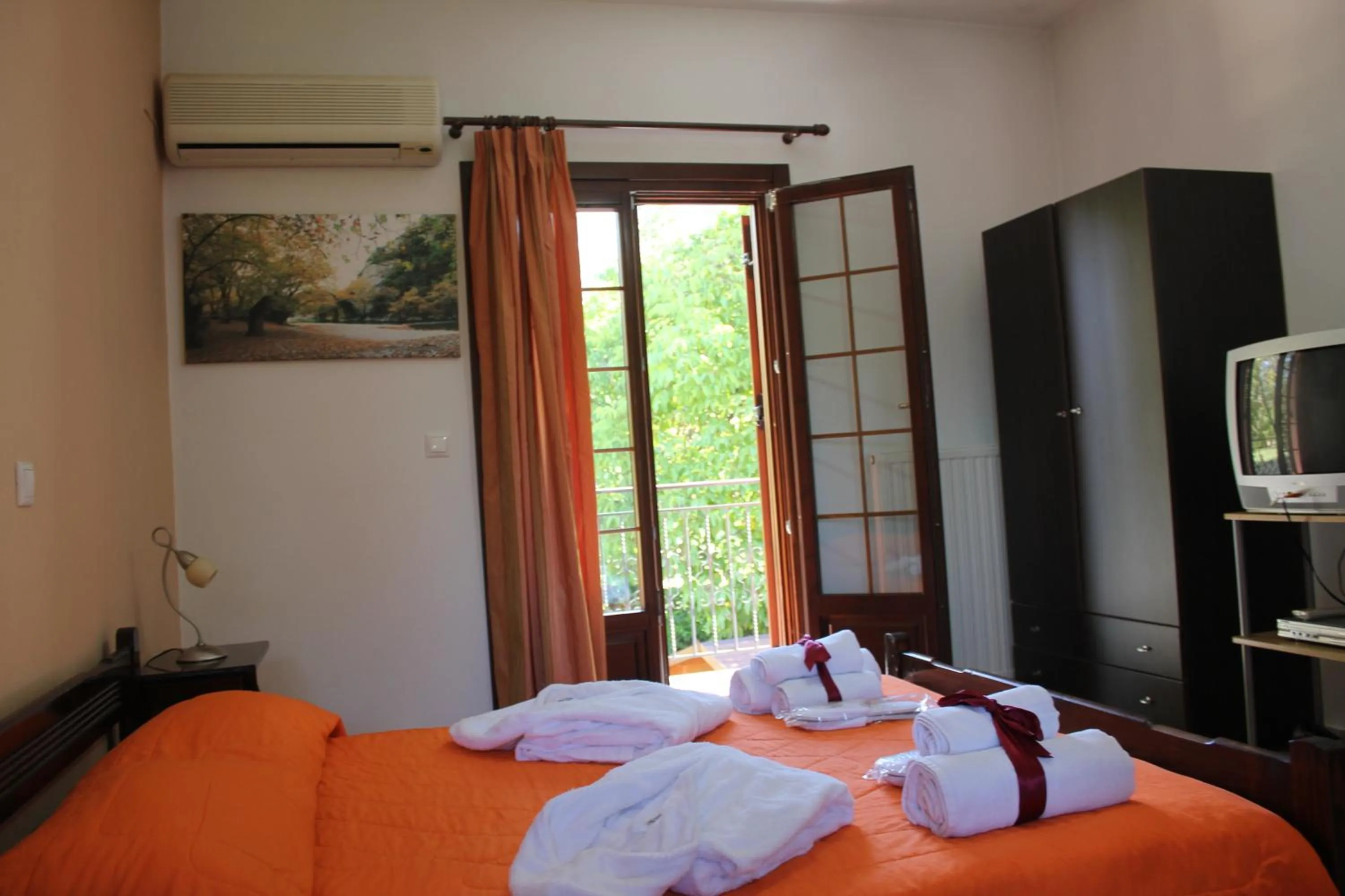 Bed in Artemis Apartments