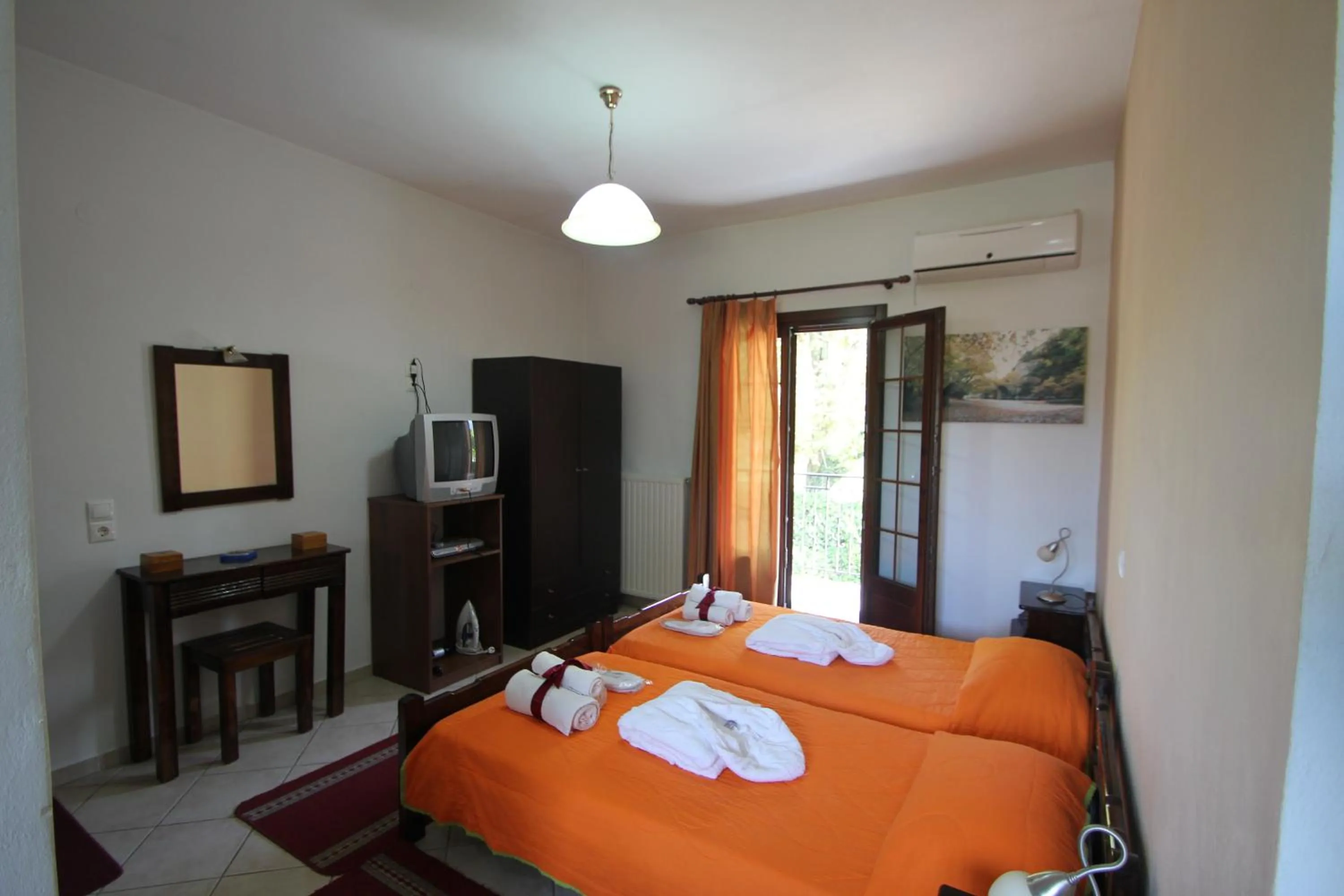 Bed in Artemis Apartments