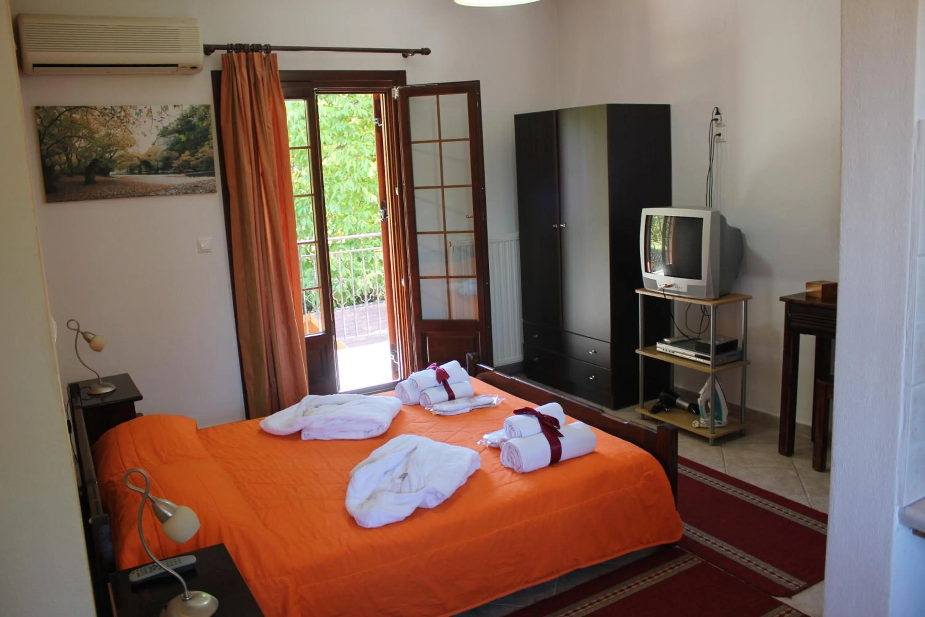 Bed in Artemis Apartments