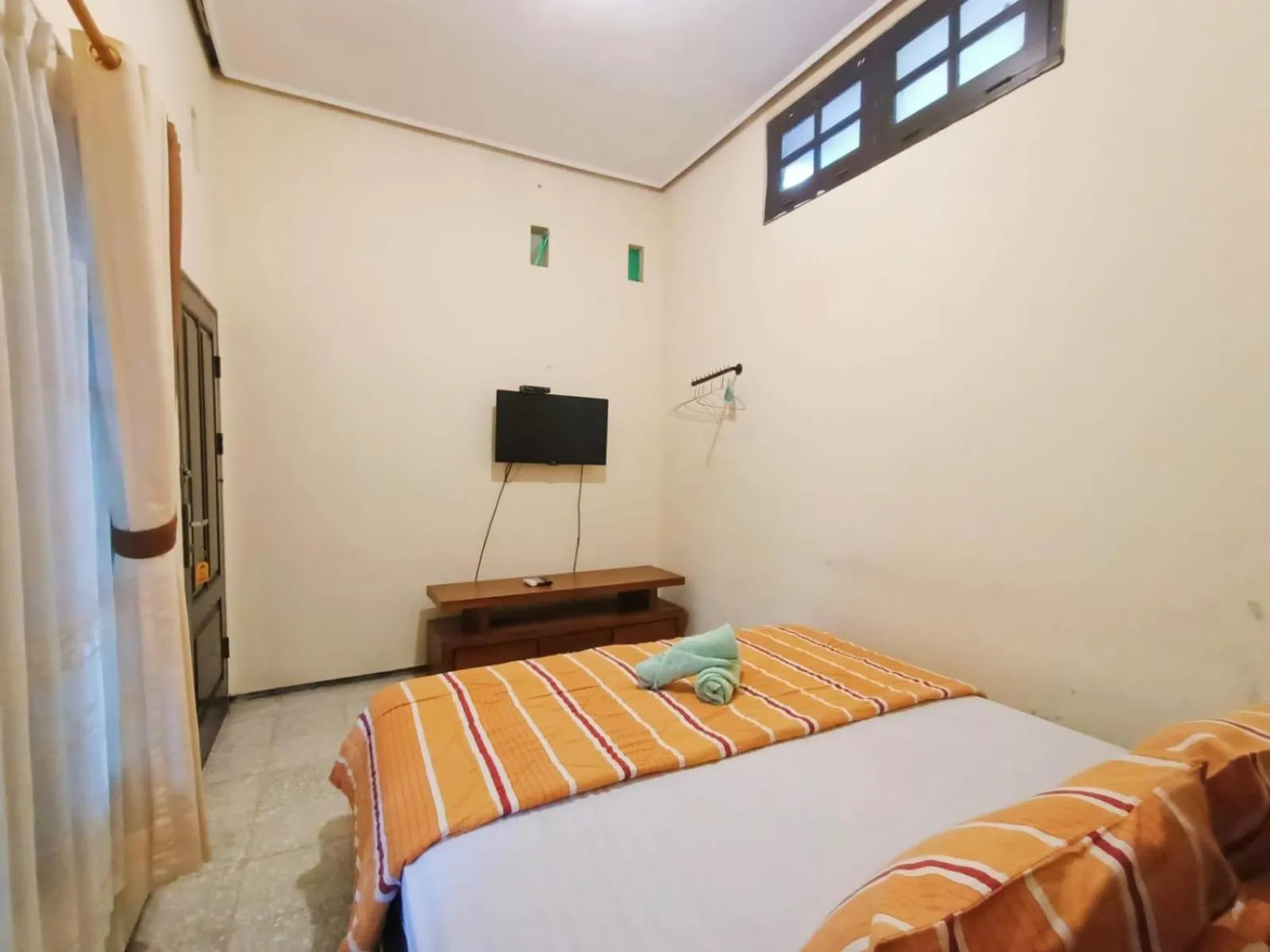 Bed in Rumah Kami Guest House