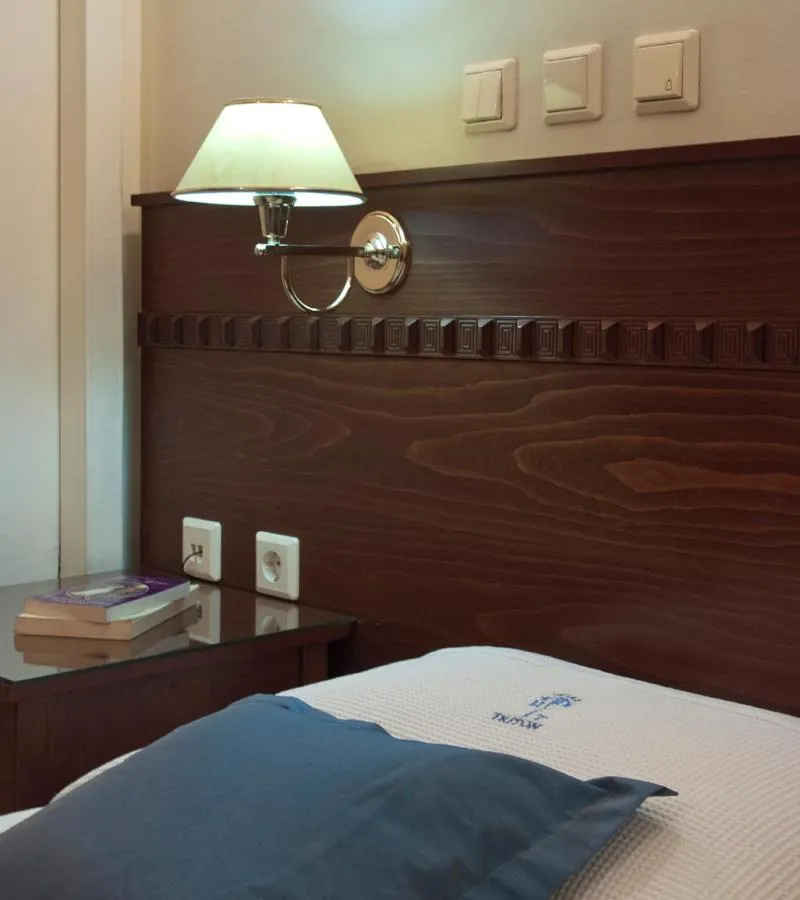 Bed in Triton Hotel Piraeus