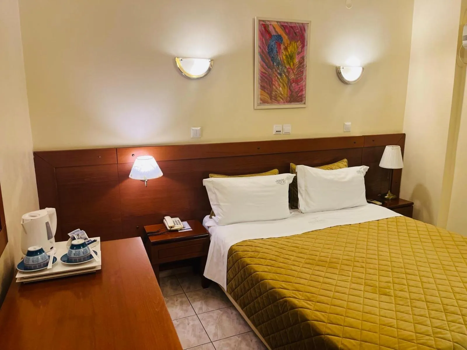 Bed in Triton Hotel Piraeus