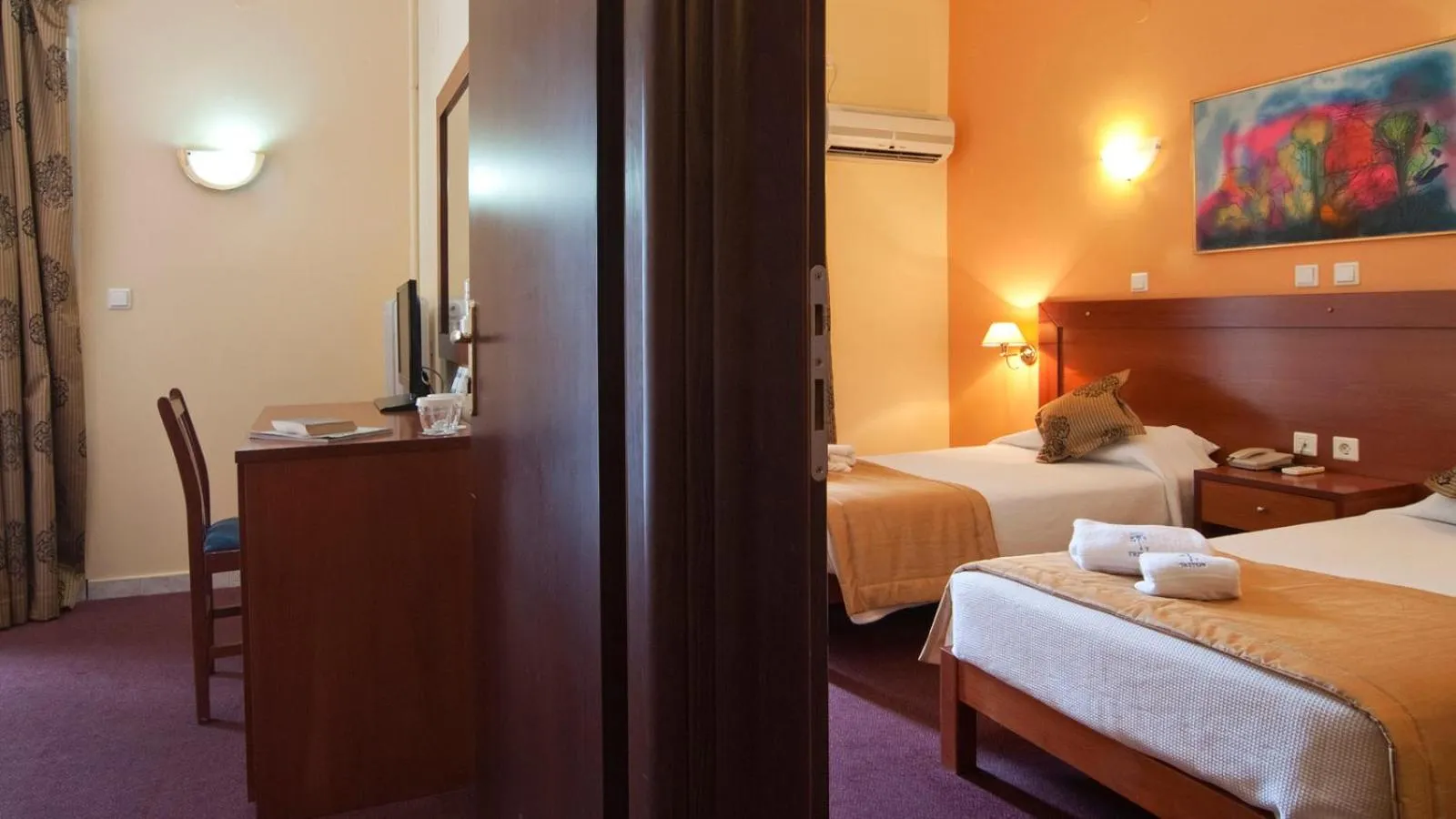 Bed in Triton Hotel Piraeus