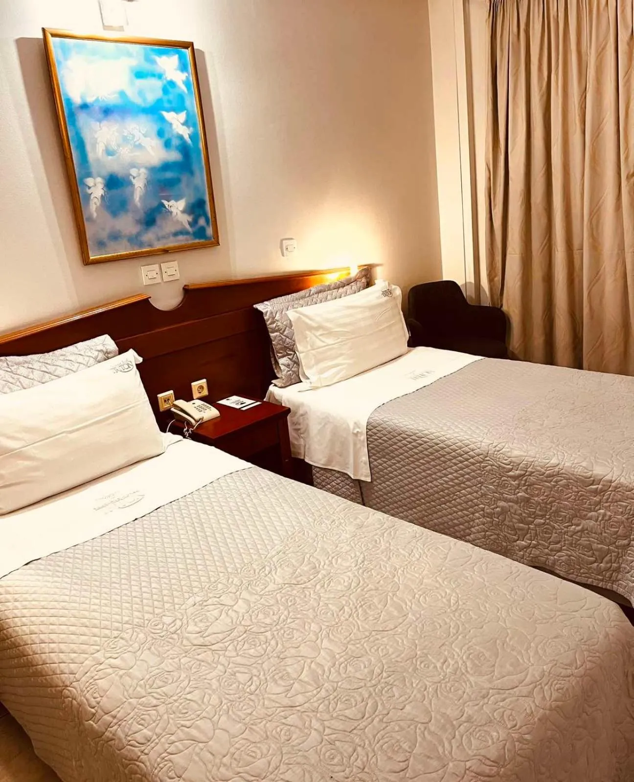 Bed in Triton Hotel Piraeus