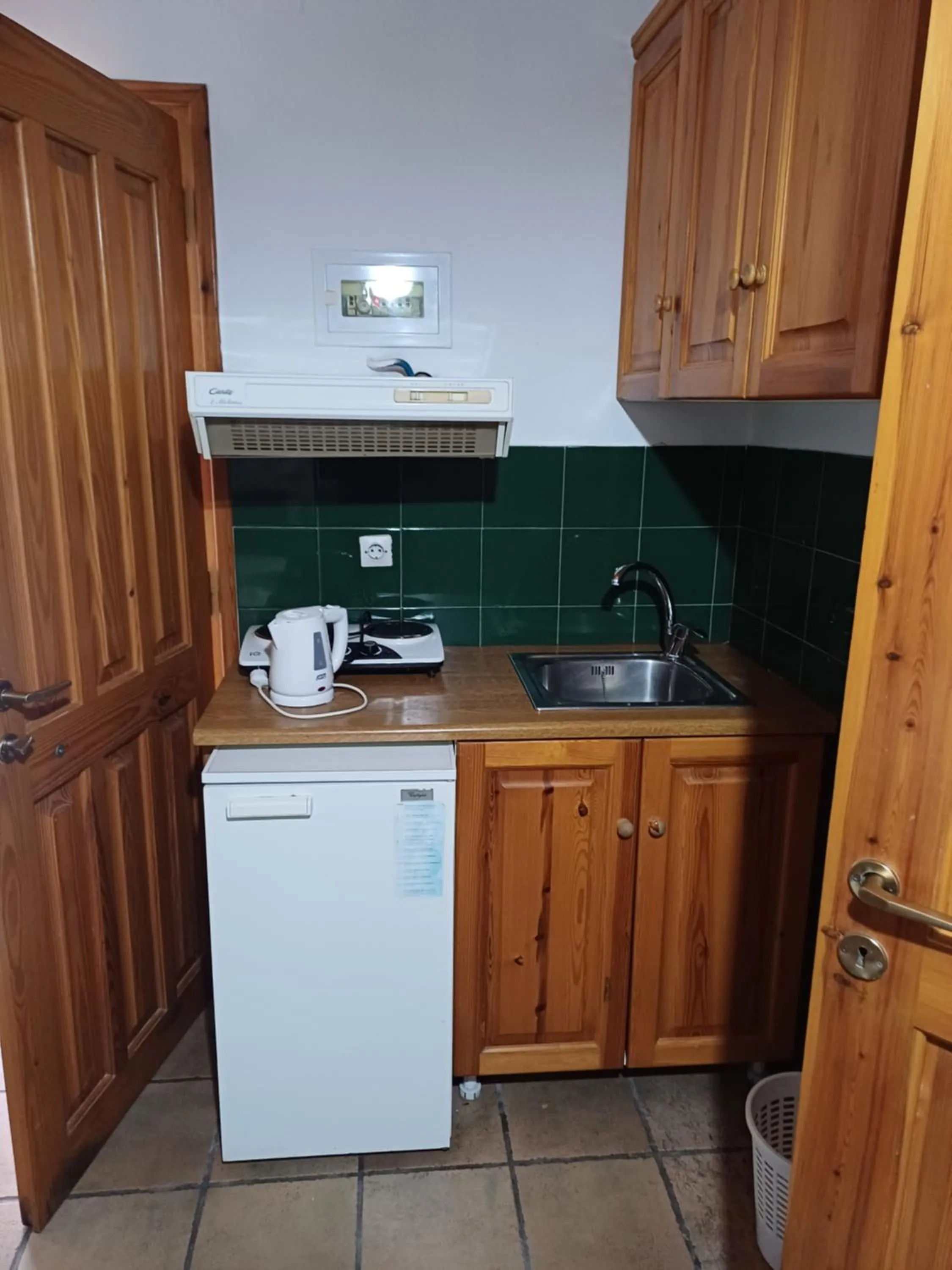 kitchen in Siroco's Rooms And Studios