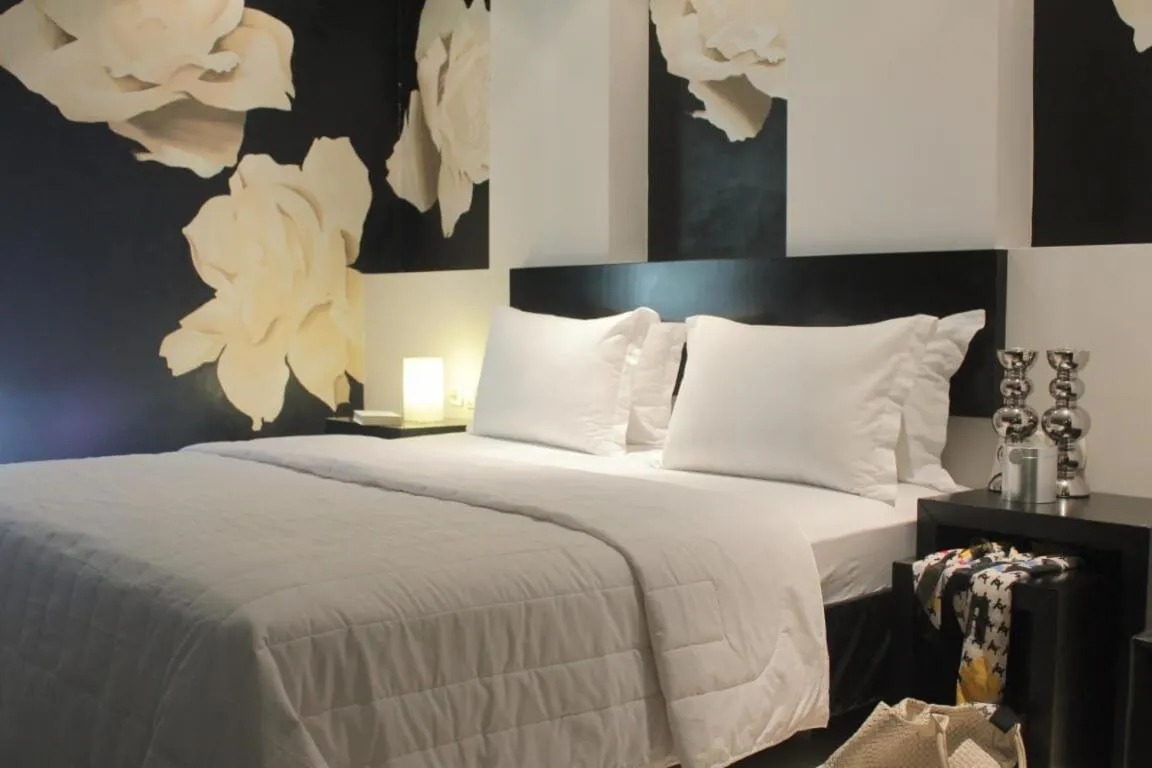 Bed in Galaxy Art Hotel