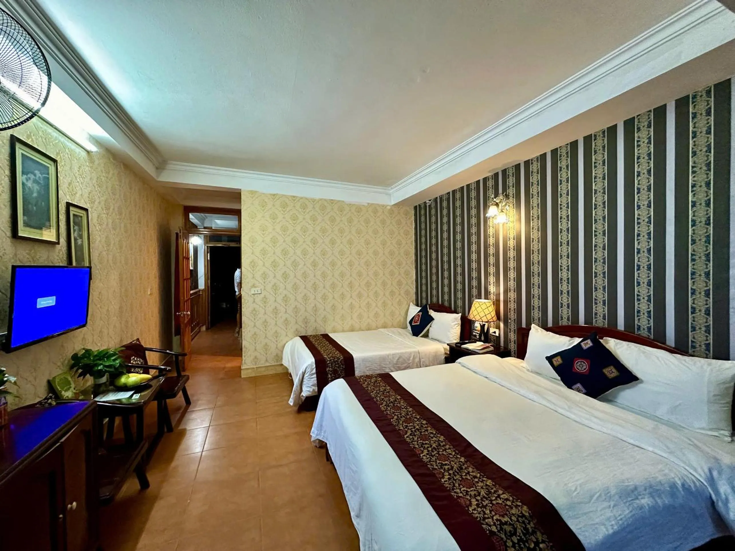 Communal lounge/ TV room, Bed in Hà Giang Hotel Sapa