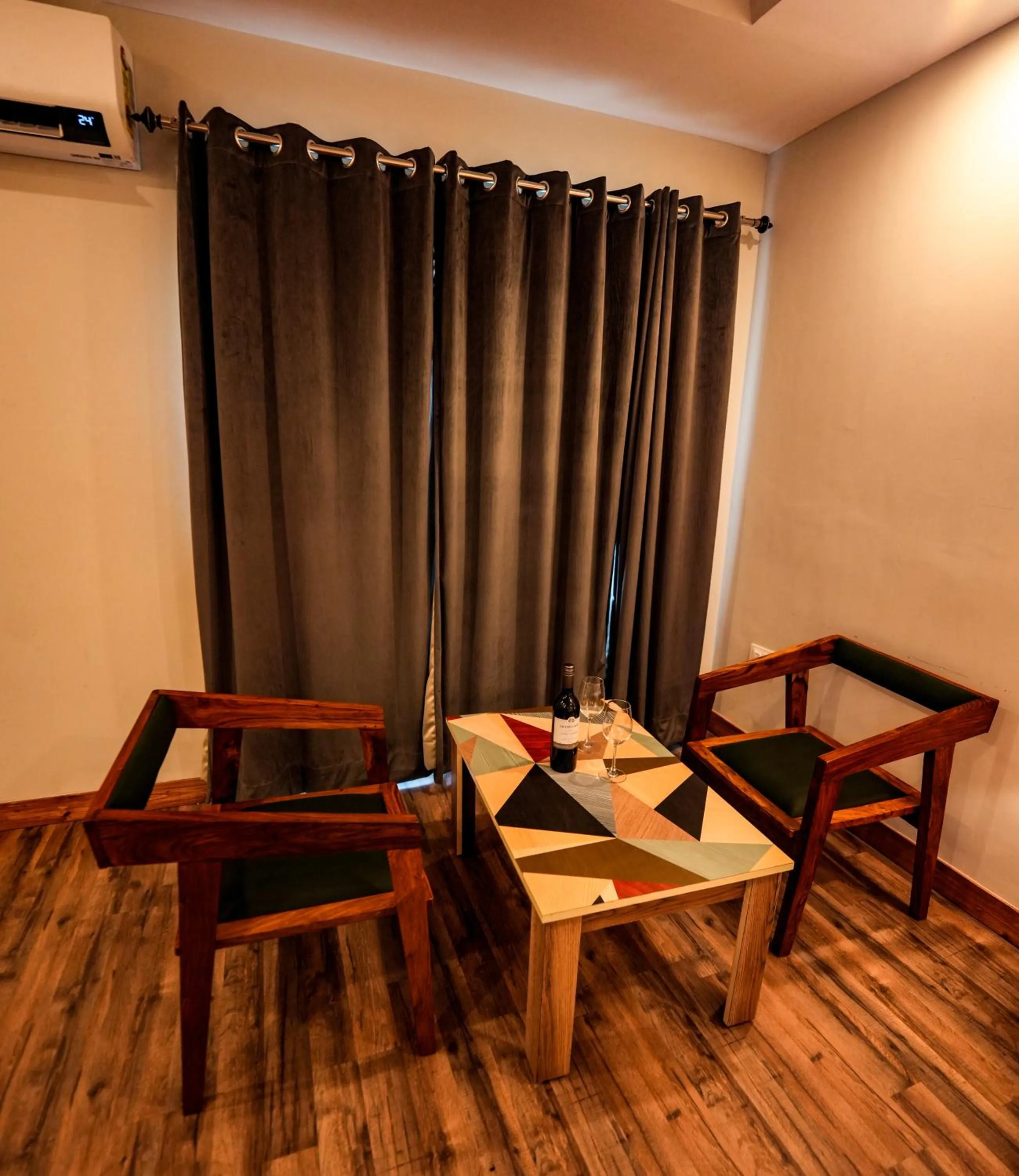 Seating area in Hotel Square One by D'Polo Dharamshala