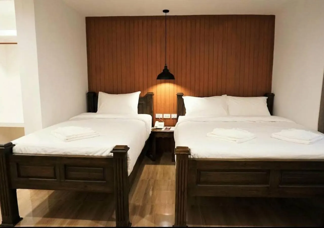 Bed in Lanna Haven Hotel