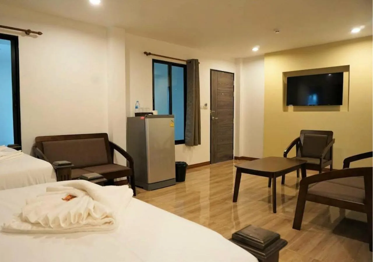 Seating area, Bed in Lanna Haven Hotel