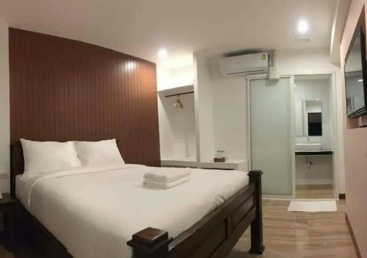 Bed in Lanna Haven Hotel