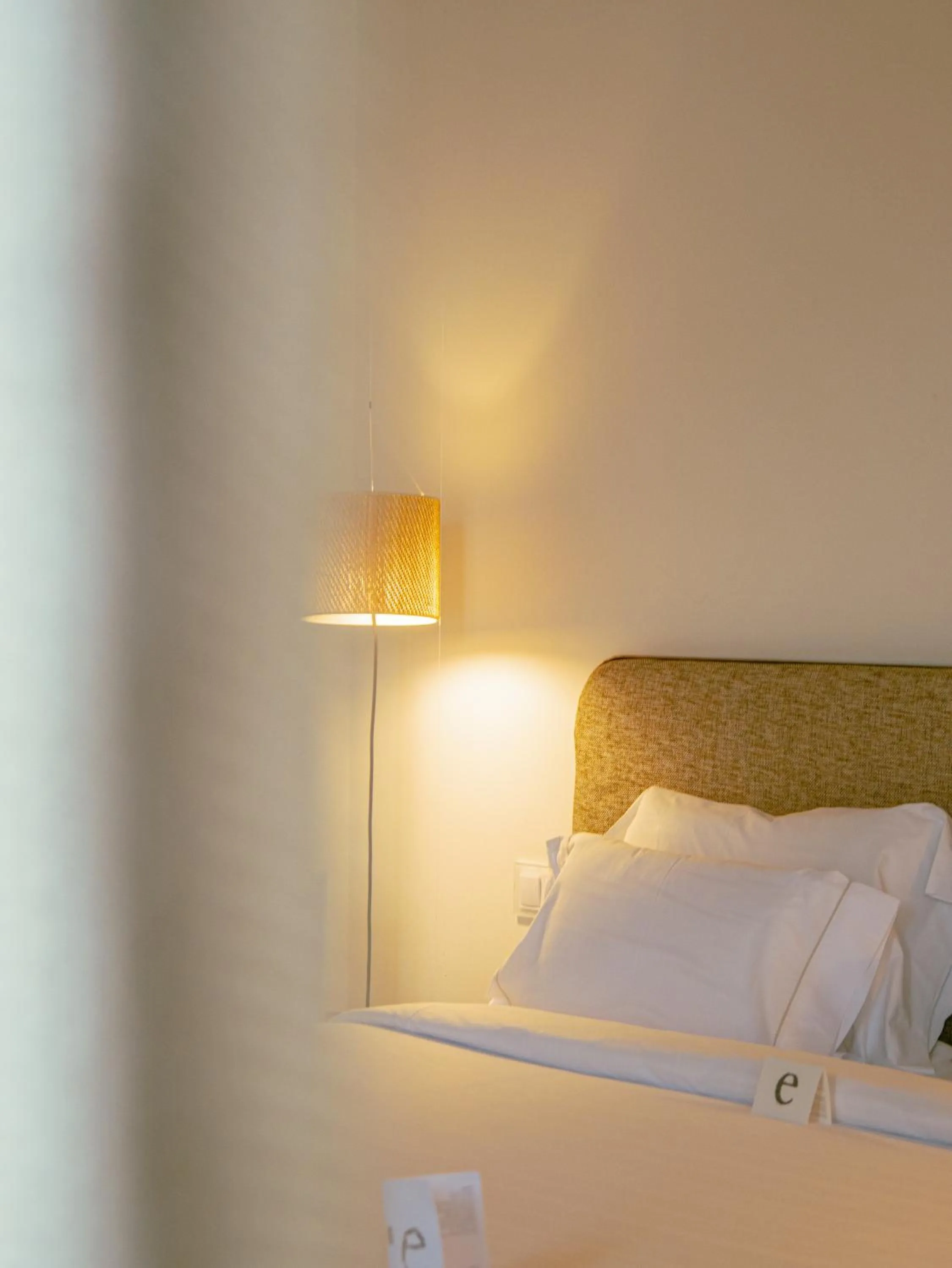 Bed in Hostal Empúries