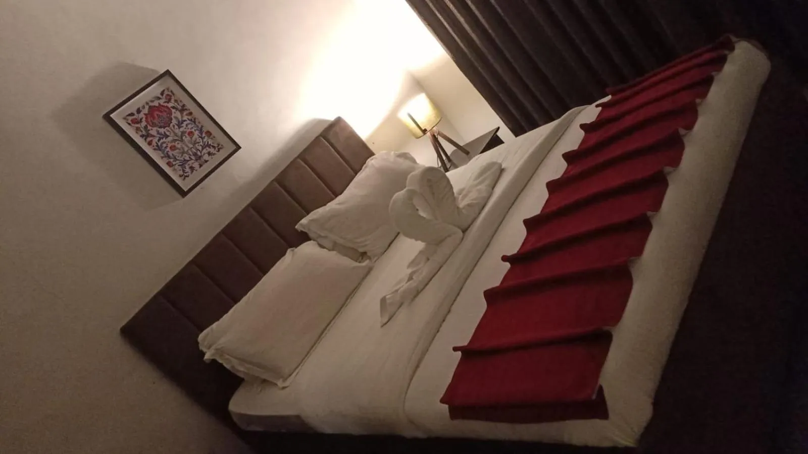 Bed in Tamrah Suites Hotel