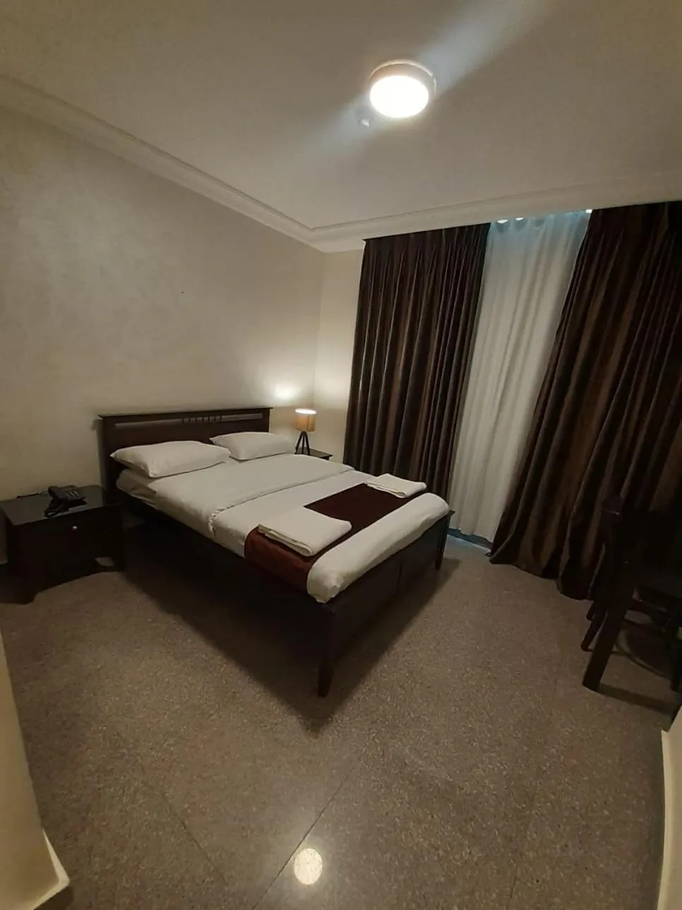 Bedroom, Bed in Tamrah Suites Hotel