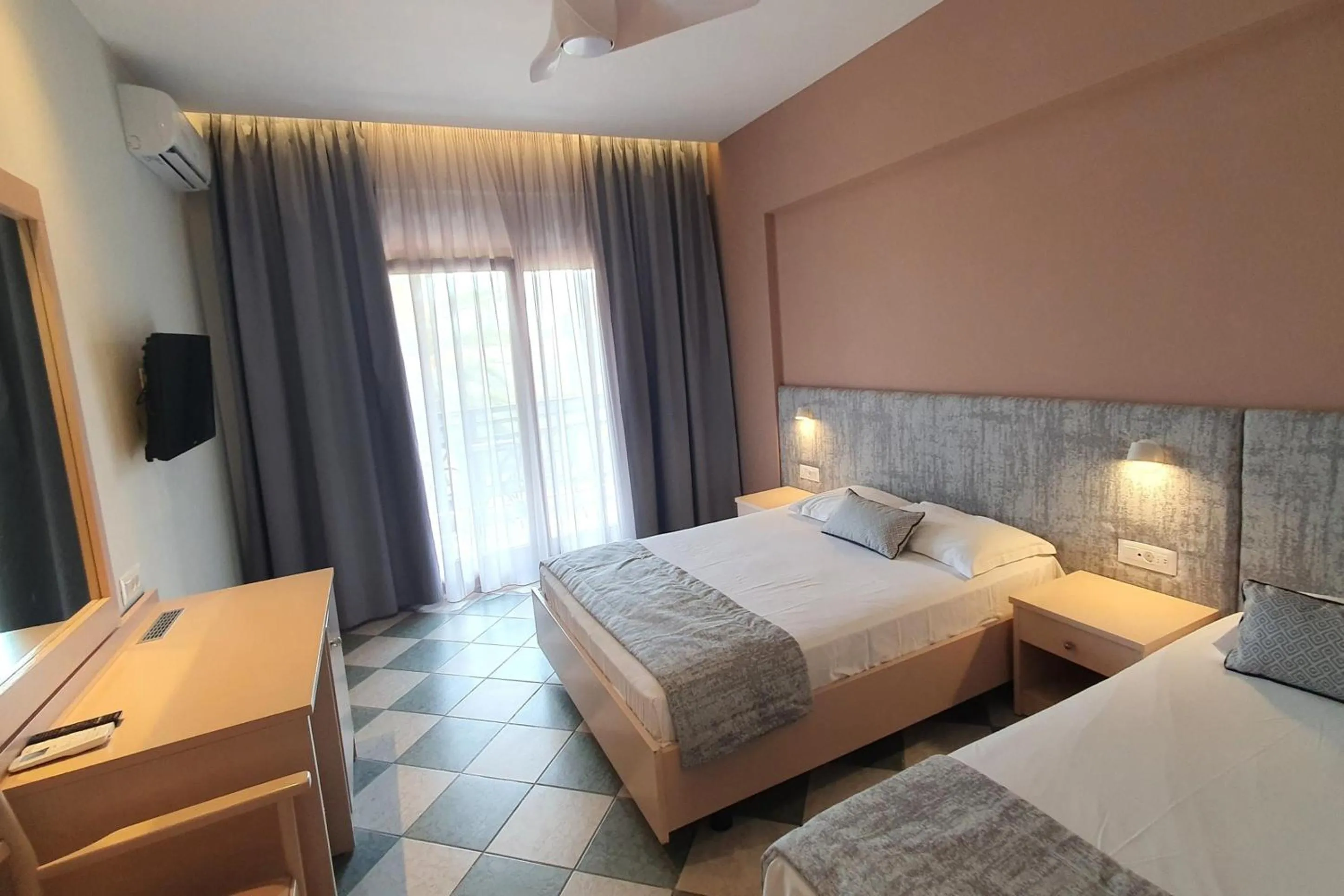 Bed in Palladium Hotel