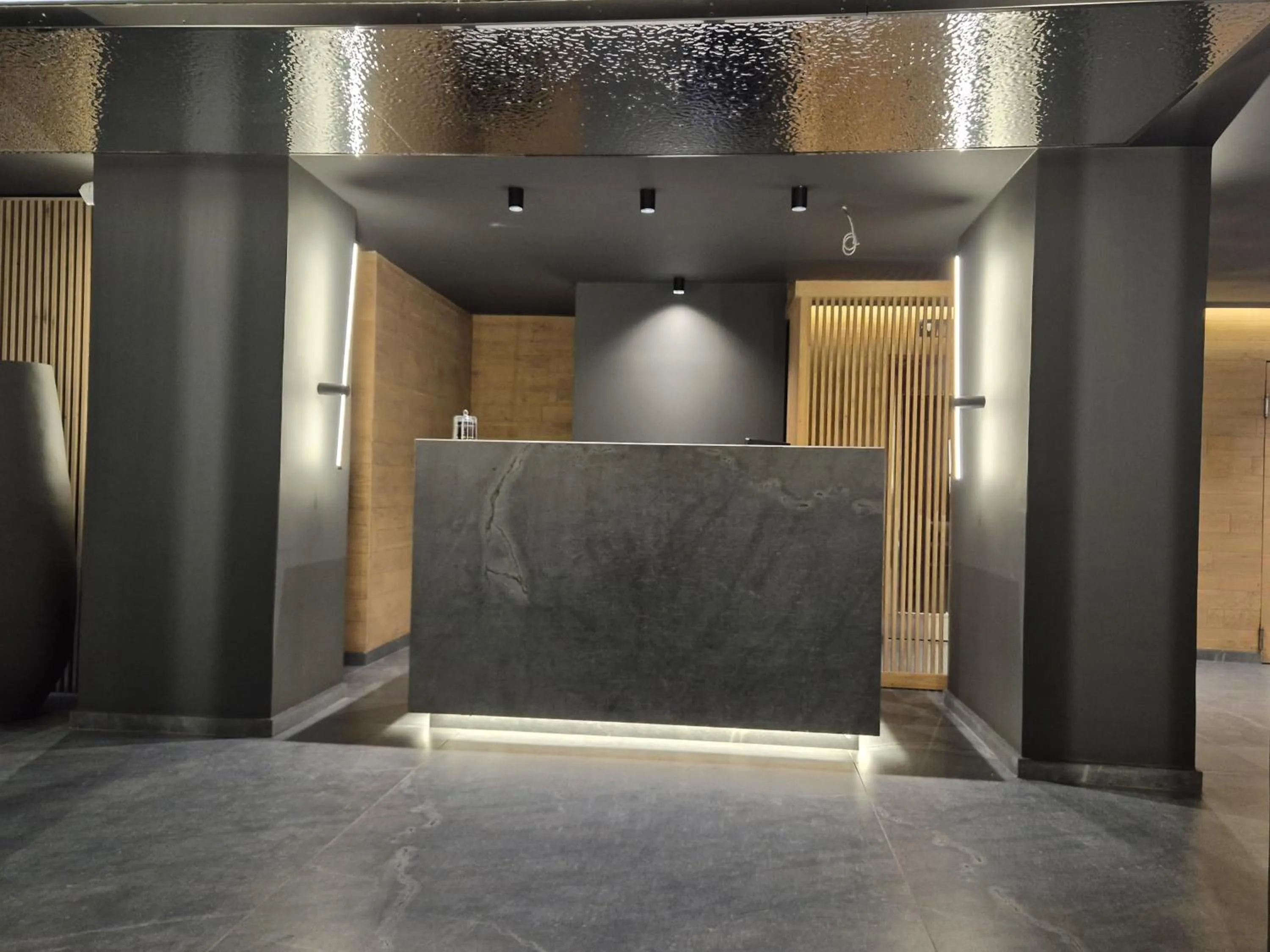 Lobby or reception in Alassia Hotel