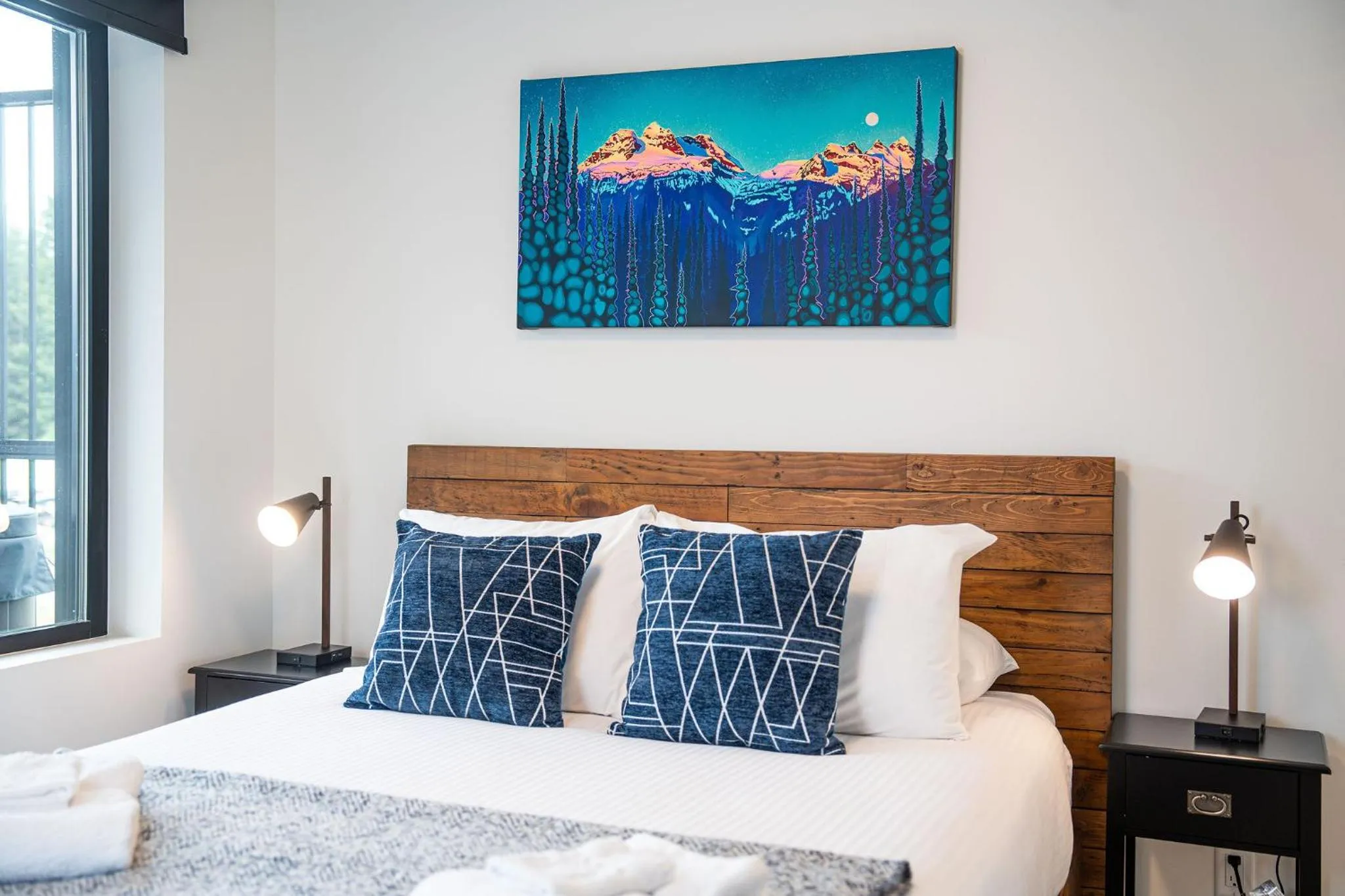 Bed in Switchback Suite by Revelstoke Vacations