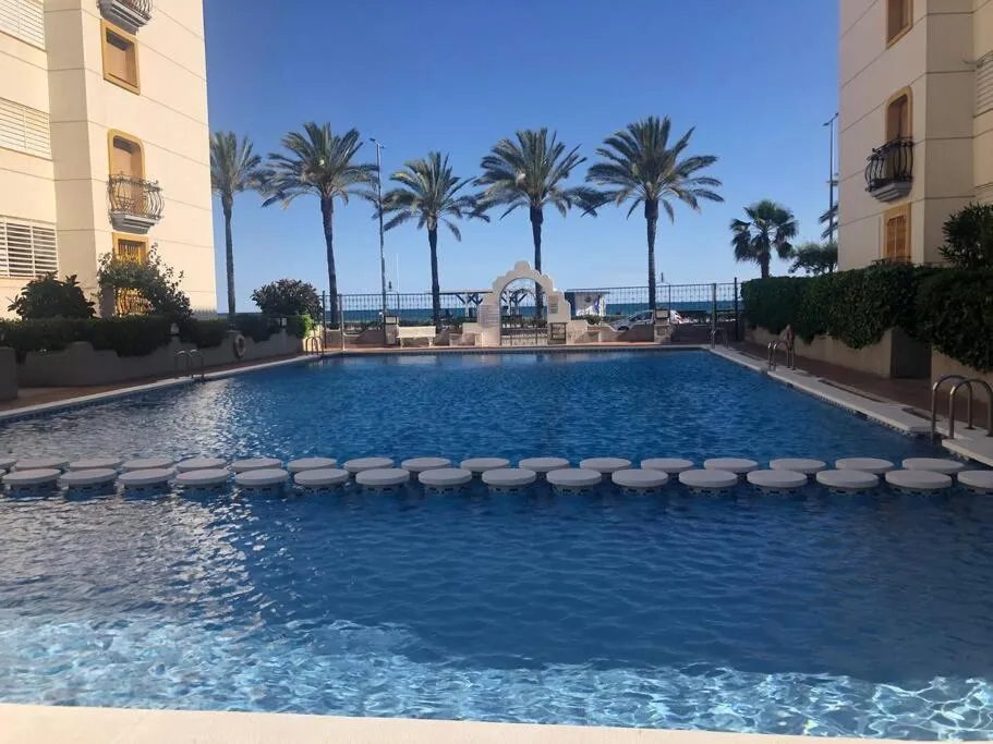 Cal SalMaré seafront apartment with rooftop terrace and pool
