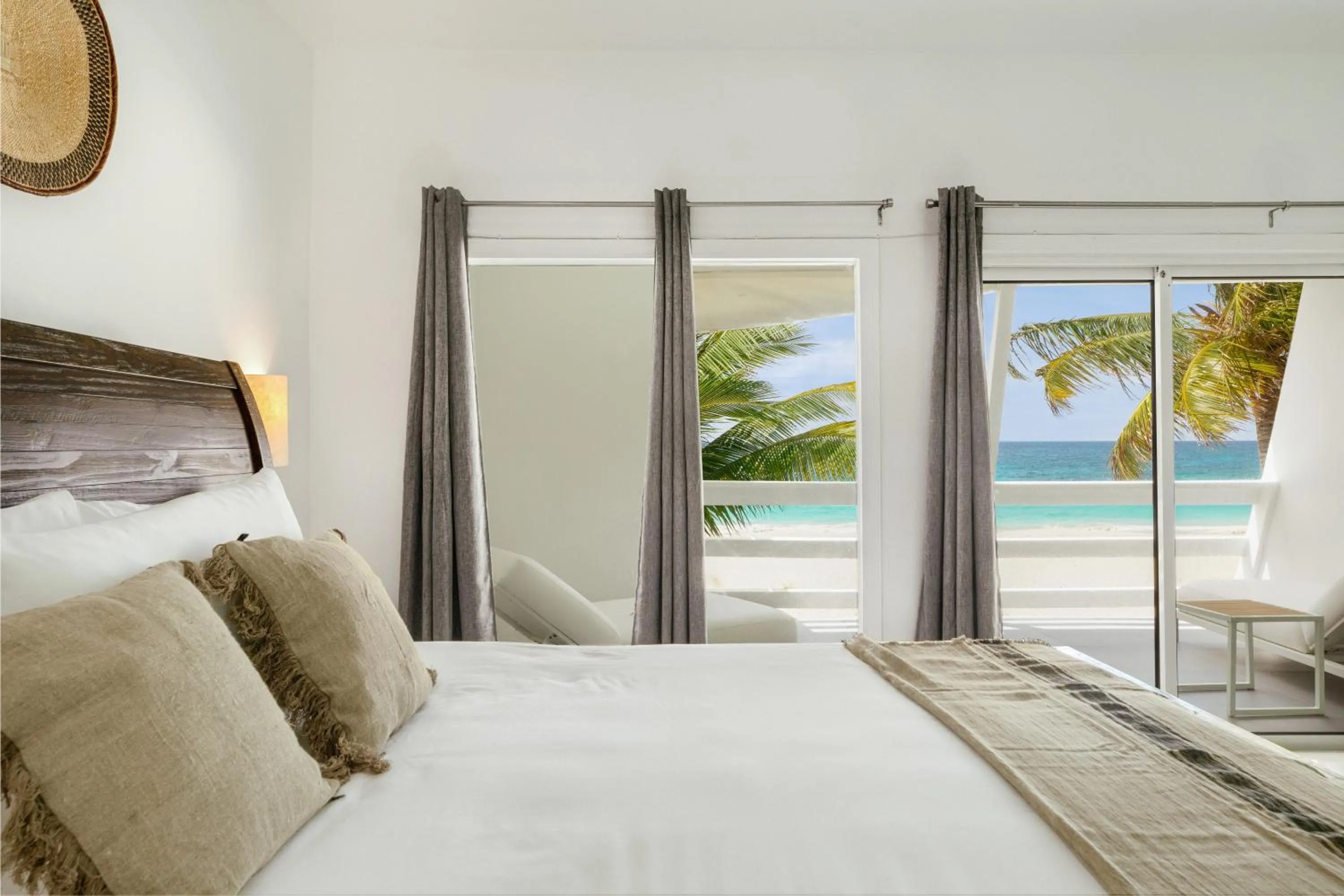 Bed in CocoVaa Beach Boutique Hotel