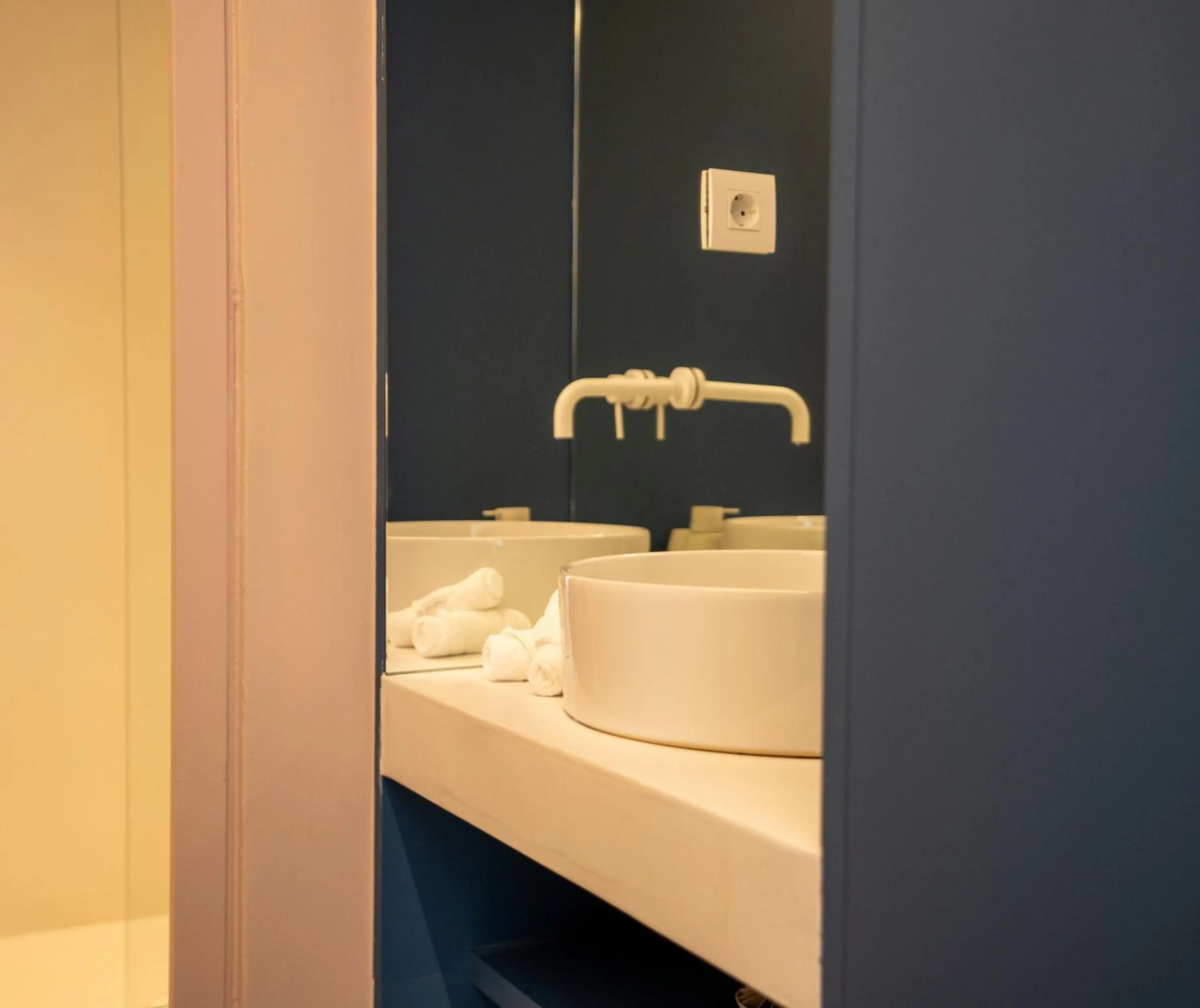 Bathroom in Neo Suites