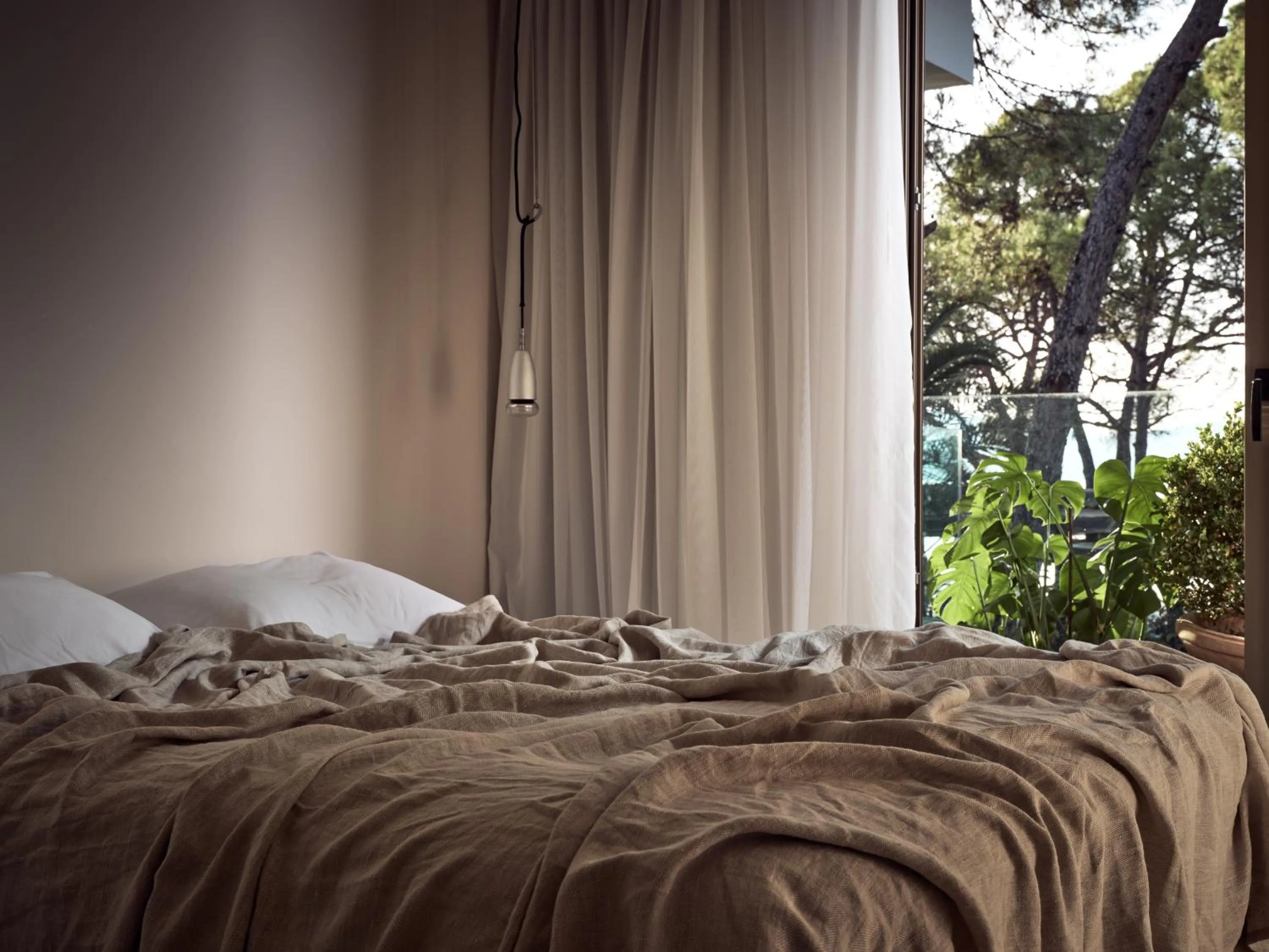 Bedroom, Bed in Ekies All Senses Resort, a Member of Design Hotels