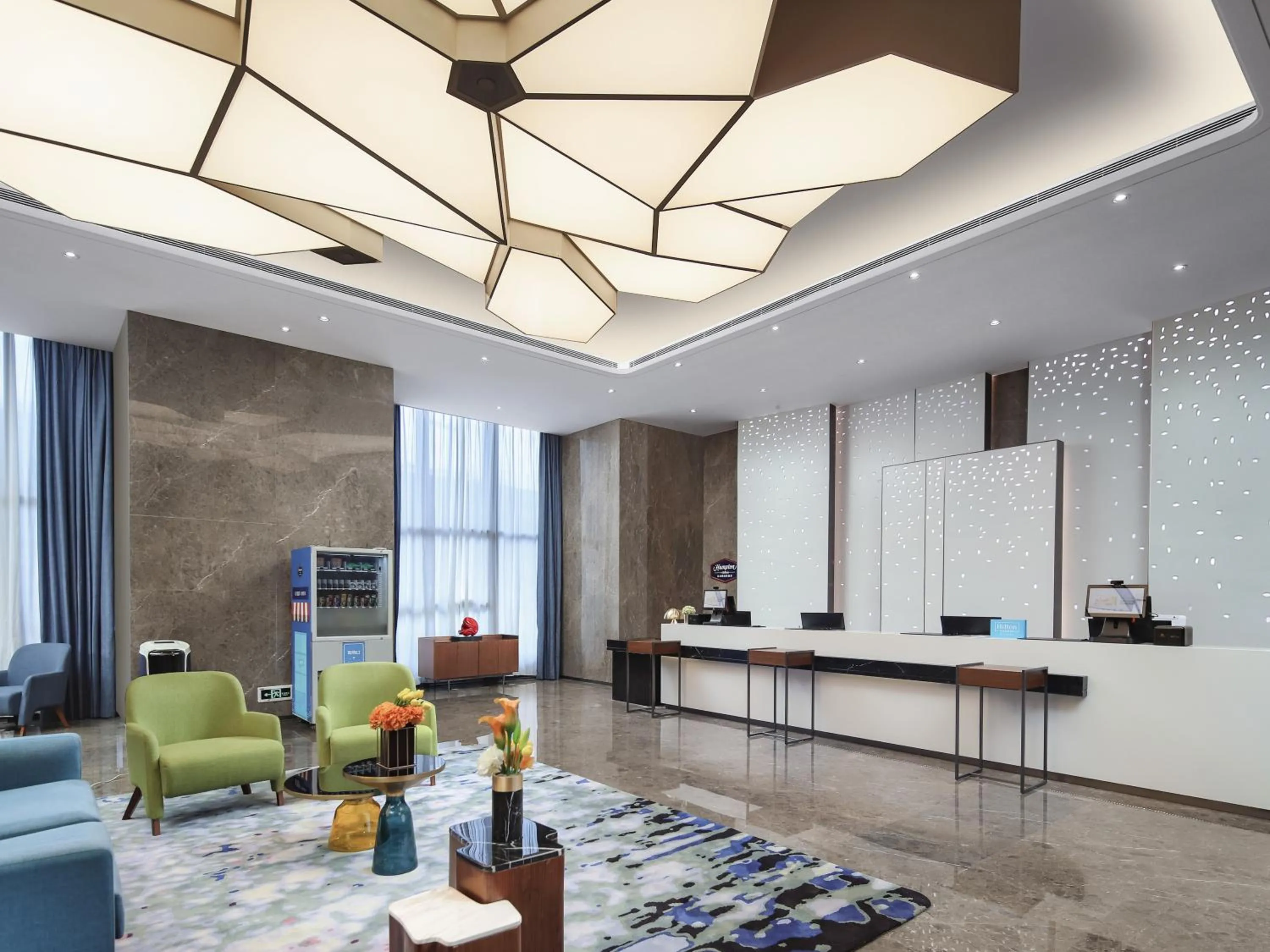 Seating area in Hampton by Hilton Shenzhen Longhua Qinghu