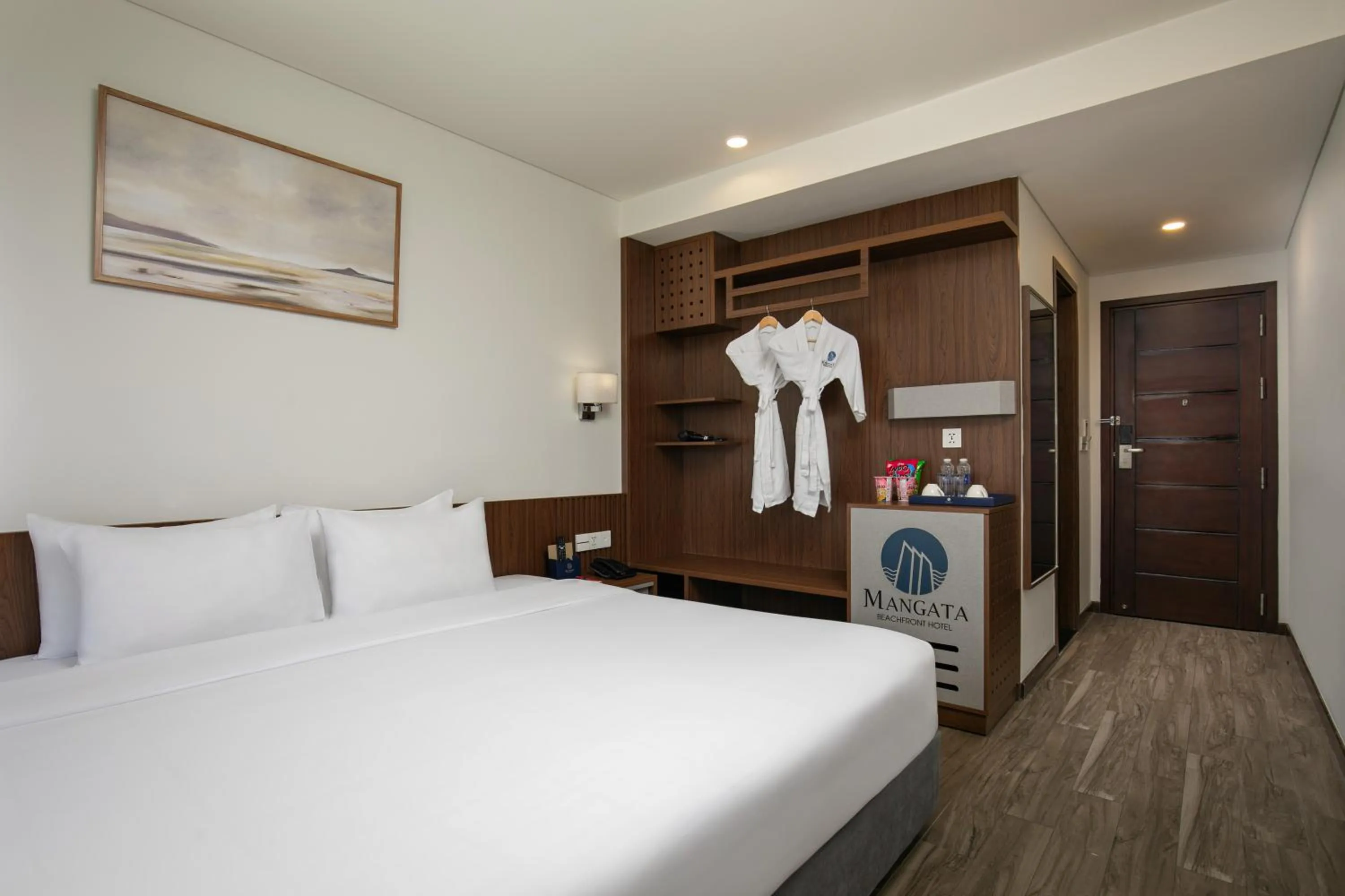 Bedroom, Bed in Mangata Beachfront Hotel - Rooftop Bar Sea View