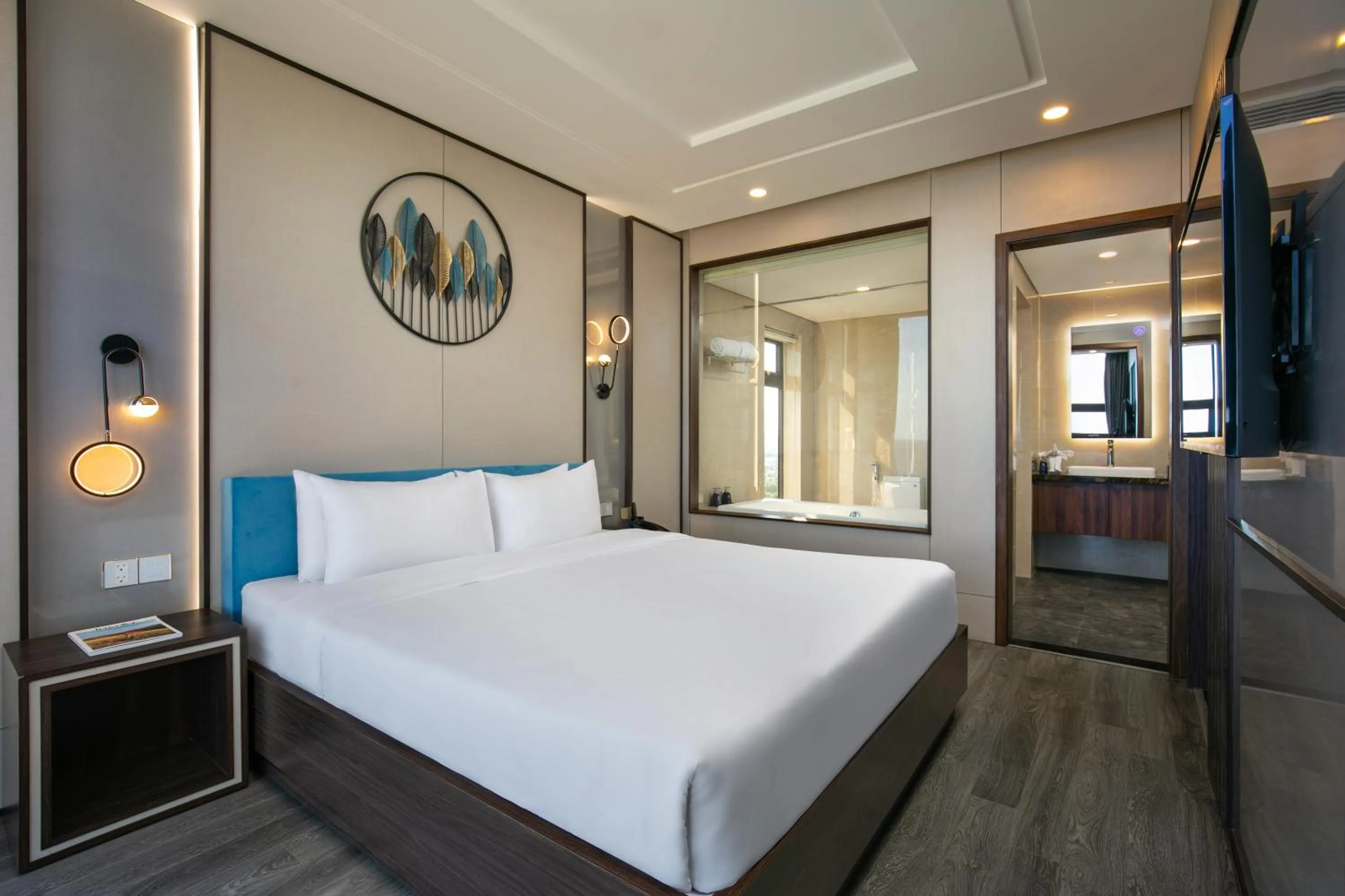 Bathroom, Bed in Mangata Beachfront Hotel - Rooftop Bar Sea View